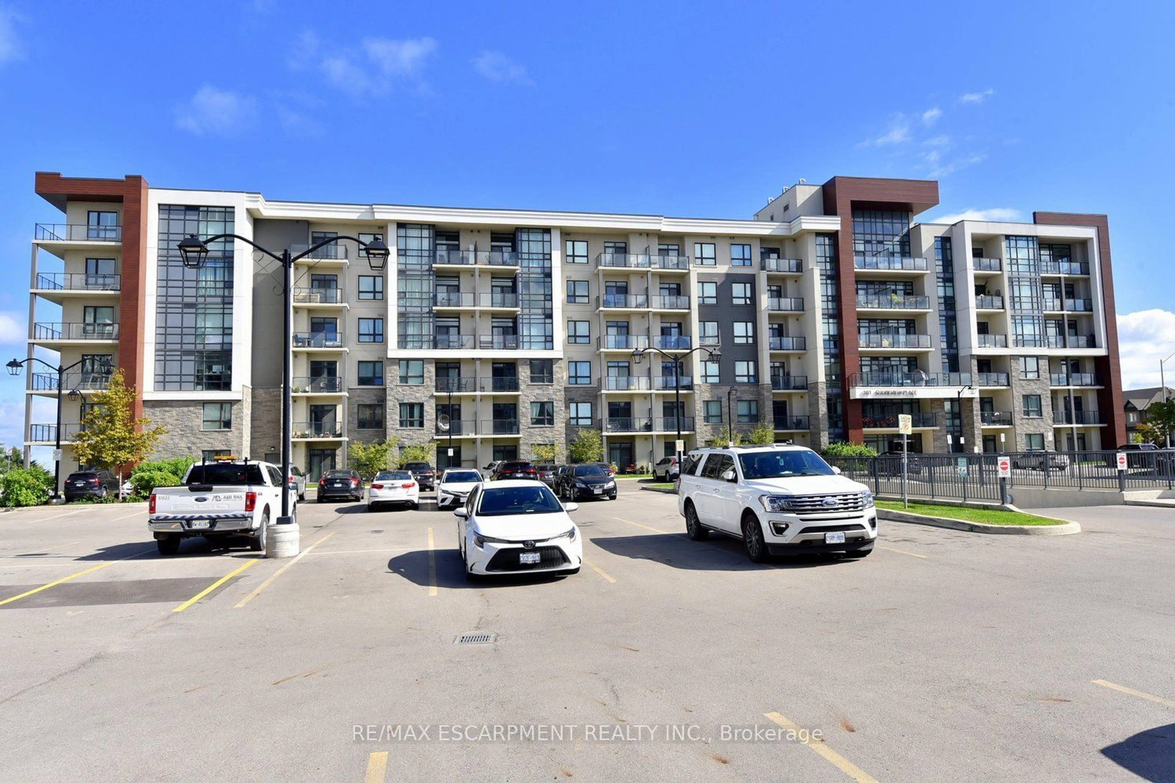 A pic from exterior of the house or condo, the street view for 101 Shoreview Pl #214, Hamilton Ontario L8E 0K3