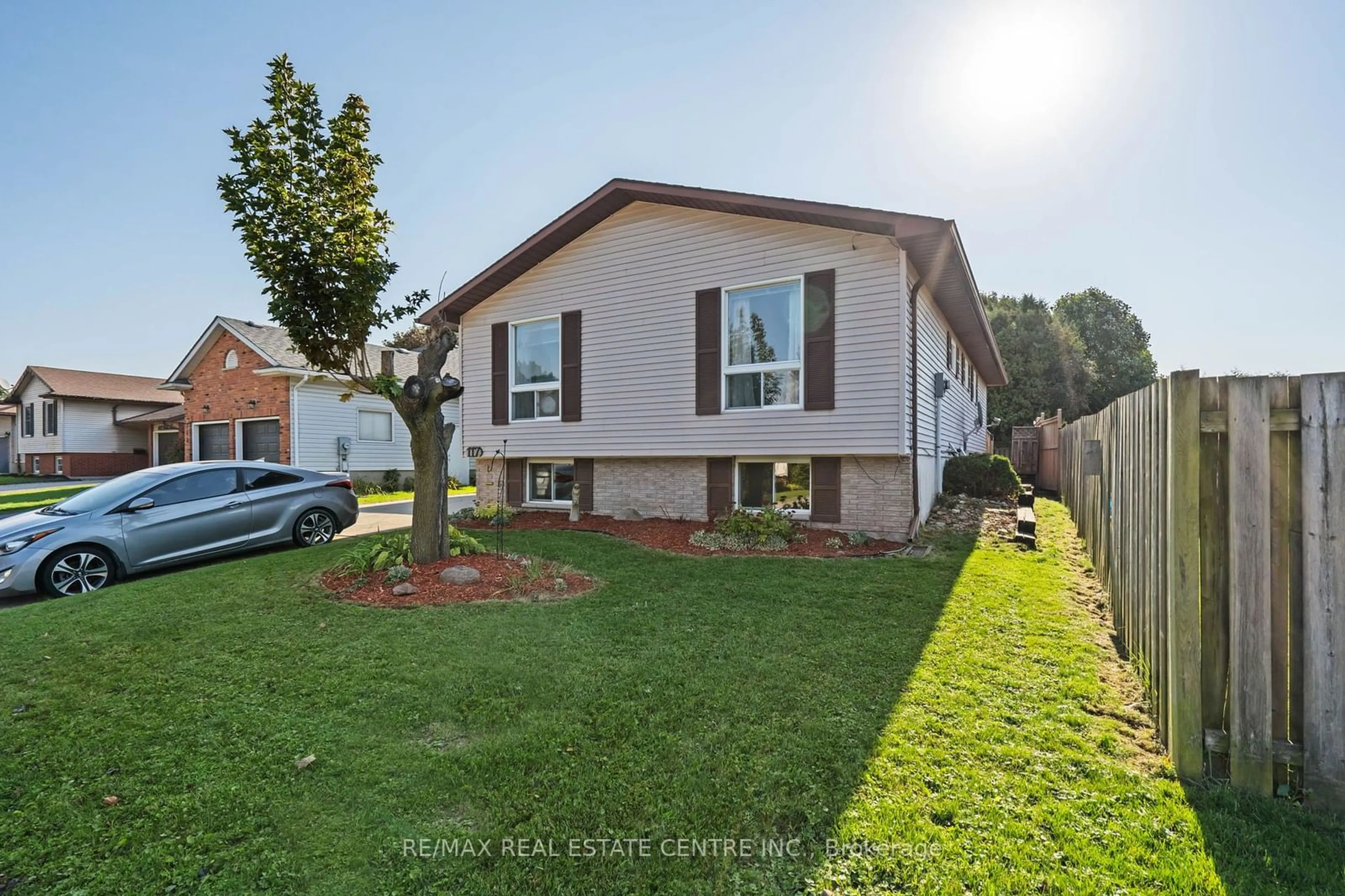 Frontside or backside of a home, the fenced backyard for 117 Melita St, Ingersoll Ontario N5C 3T2