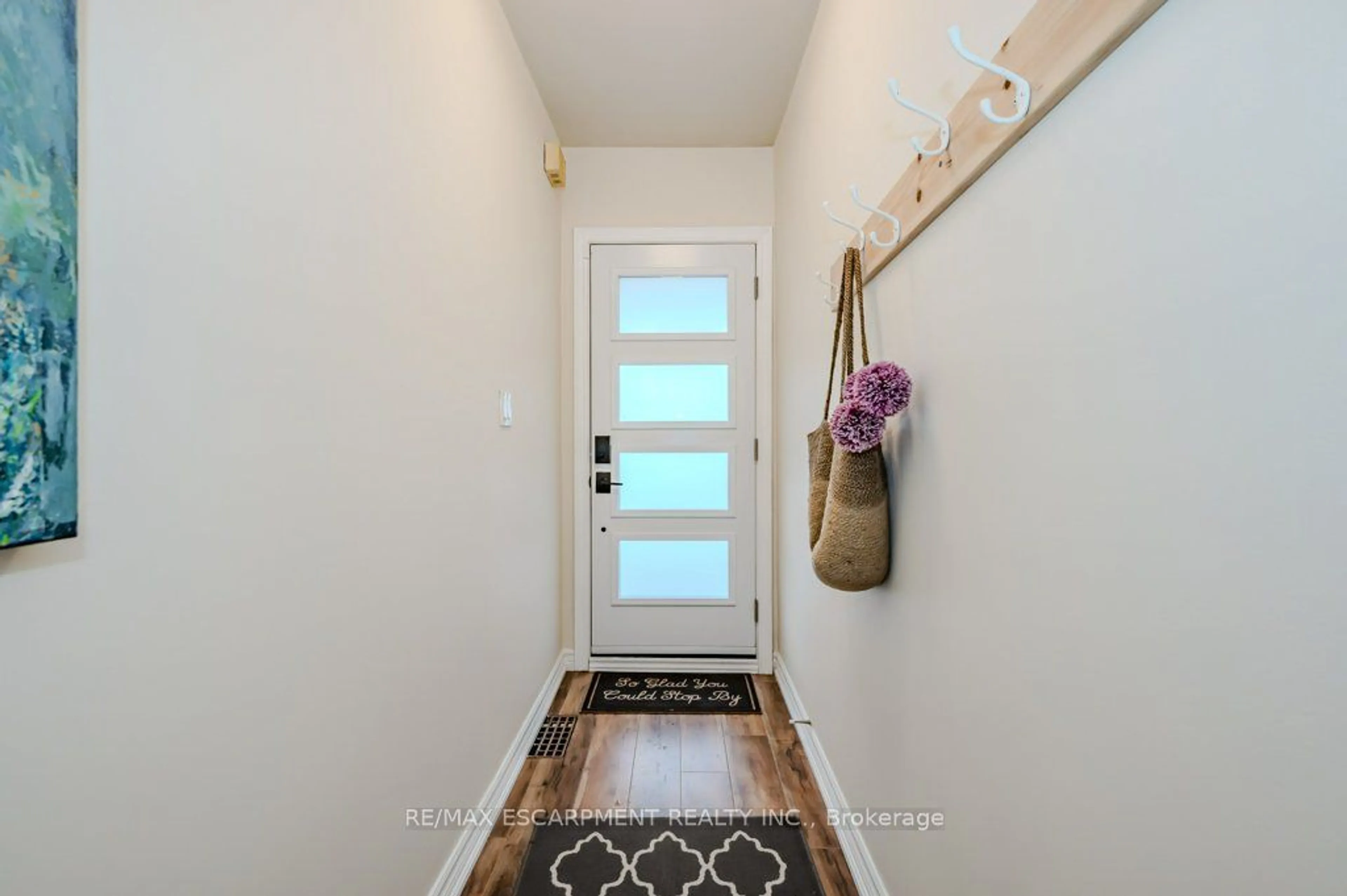 Indoor entryway, wood floors for 63 Beechwood Ave, Hamilton Ontario L8L 2S5