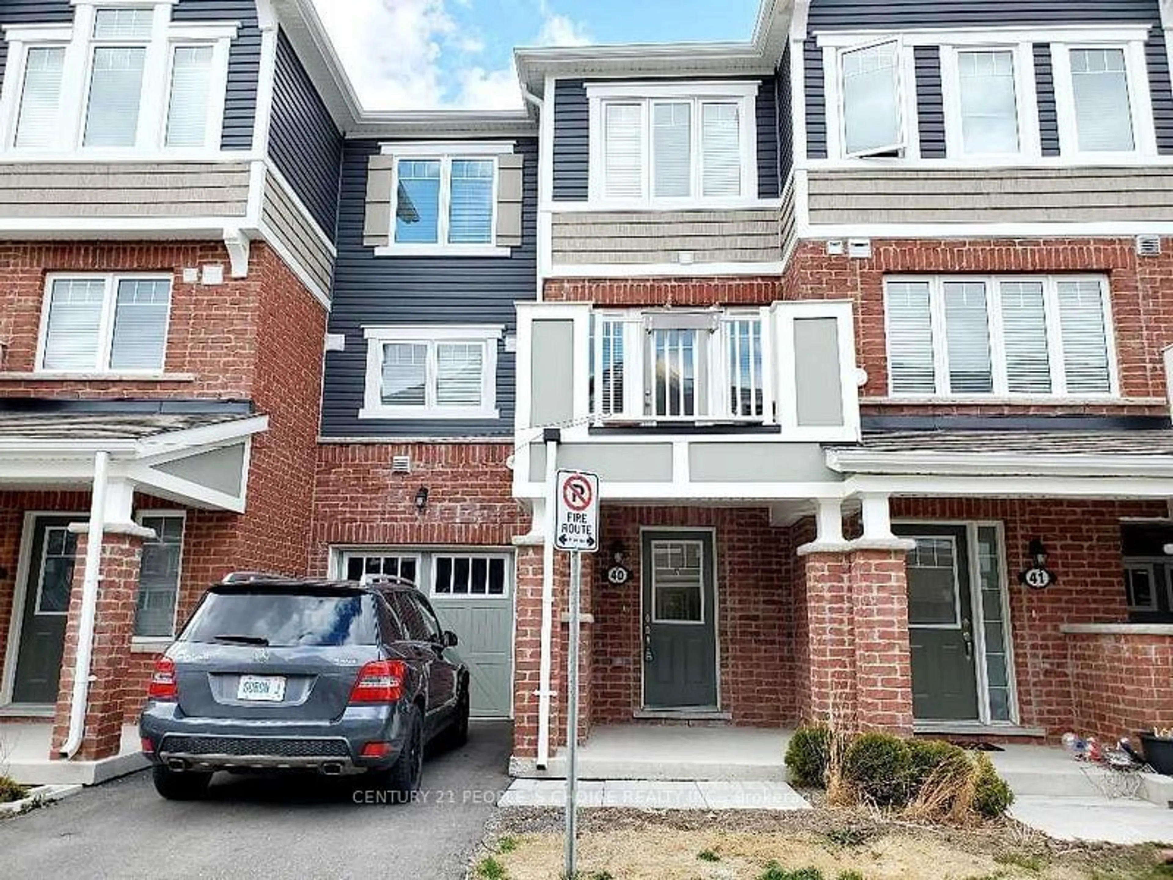 A pic from exterior of the house or condo, the street view for 143 Ridge Rd #40, Cambridge Ontario N3E 0E1