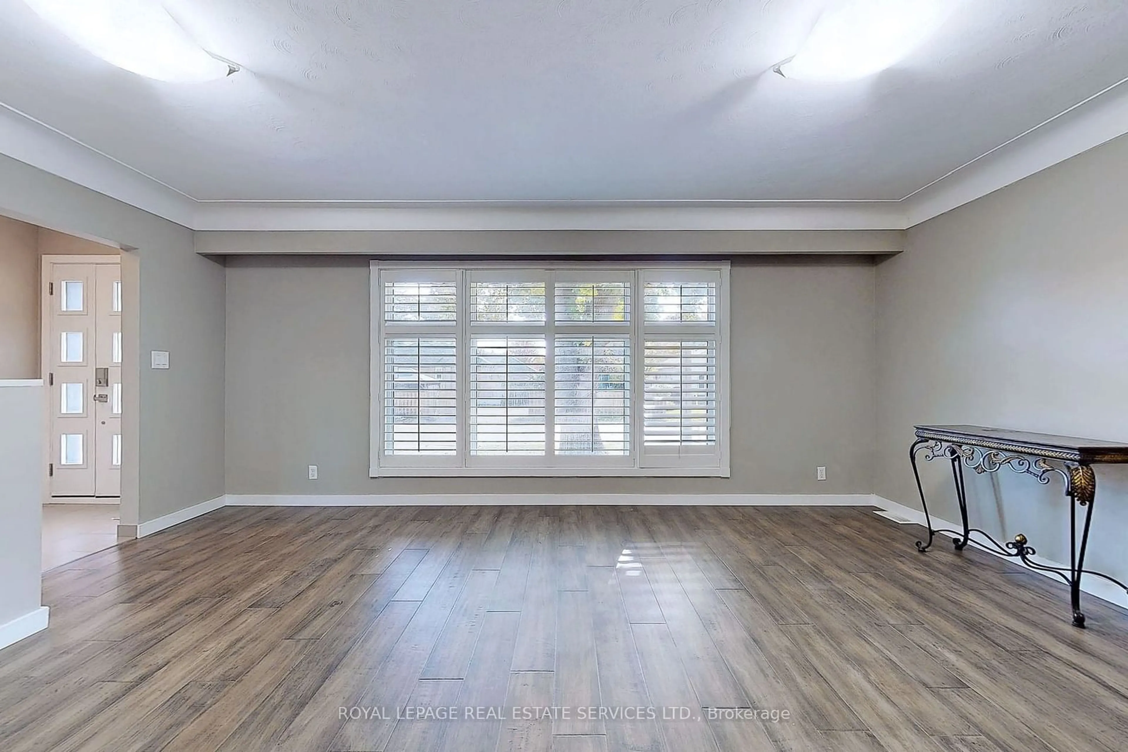 A pic of a room, wood floors for 4 Mcmaster Ave, Hamilton Ontario L9H 4M5