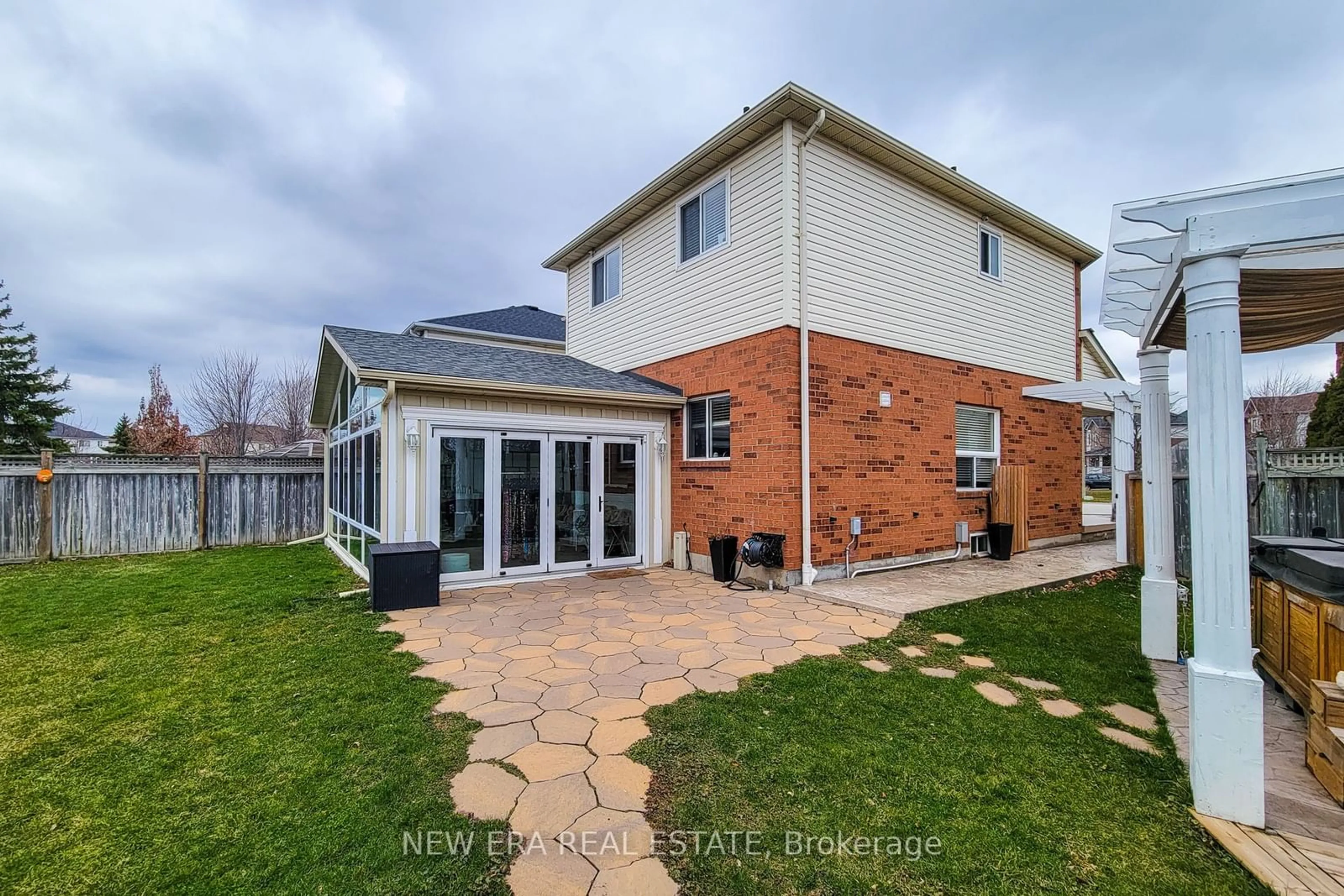 Frontside or backside of a home, the fenced backyard for 20 Pentland Rd, Hamilton Ontario L0R 2H5