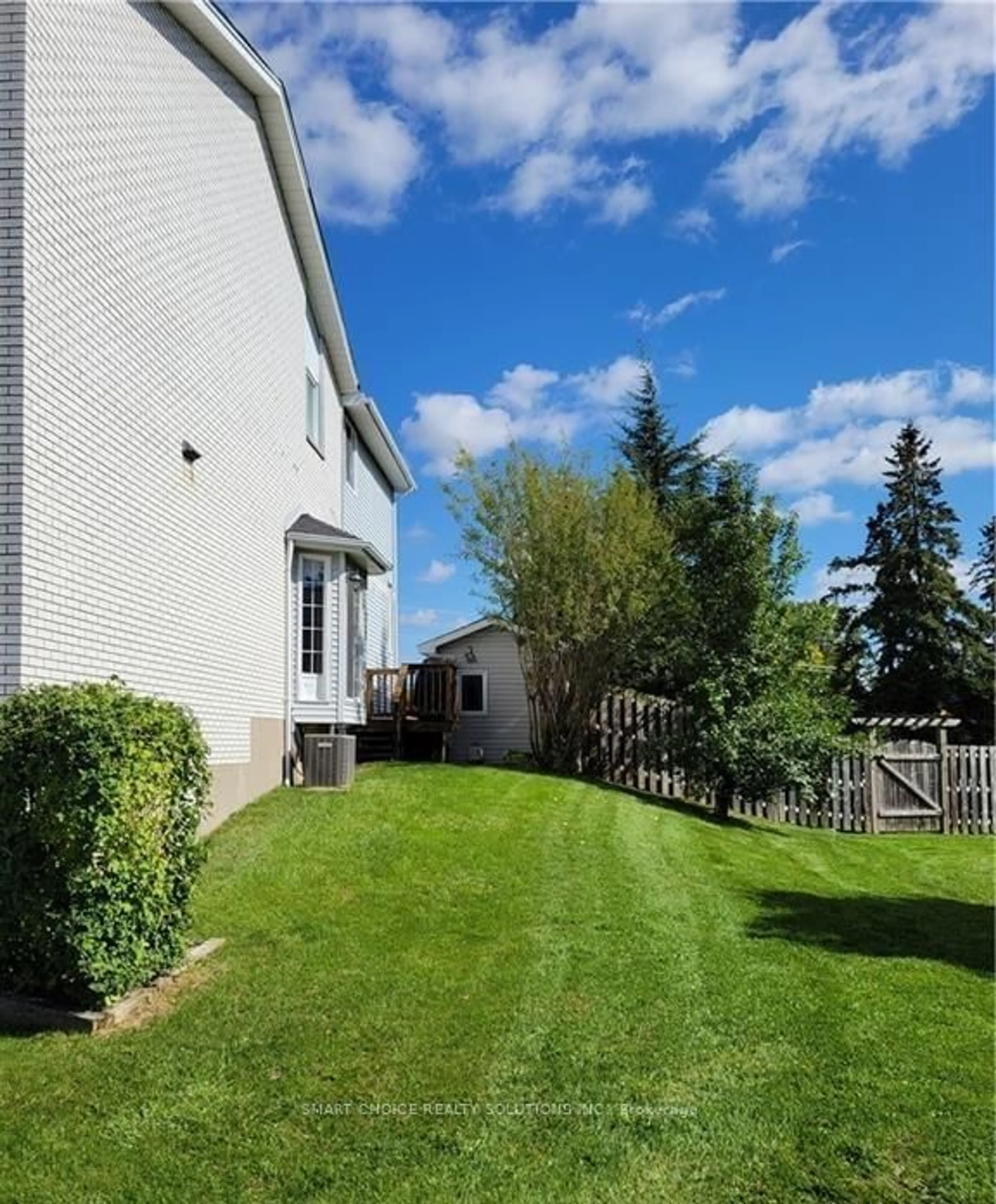 Frontside or backside of a home, the fenced backyard for 210-216 Homestead Cres, London Ontario N6G 2E5