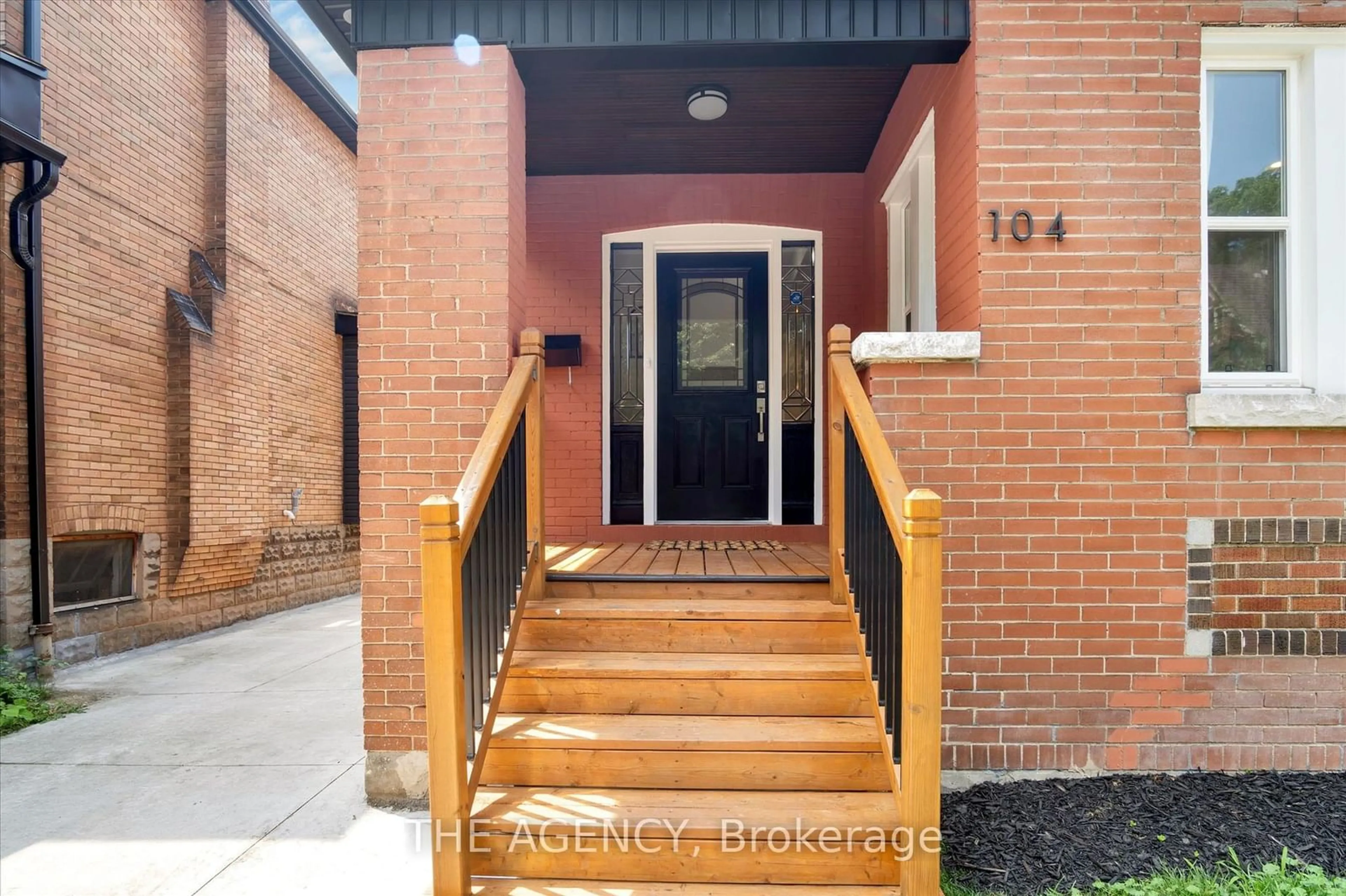 Indoor foyer, wood floors for 104 Fairholt Rd, Hamilton Ontario L8M 2T7