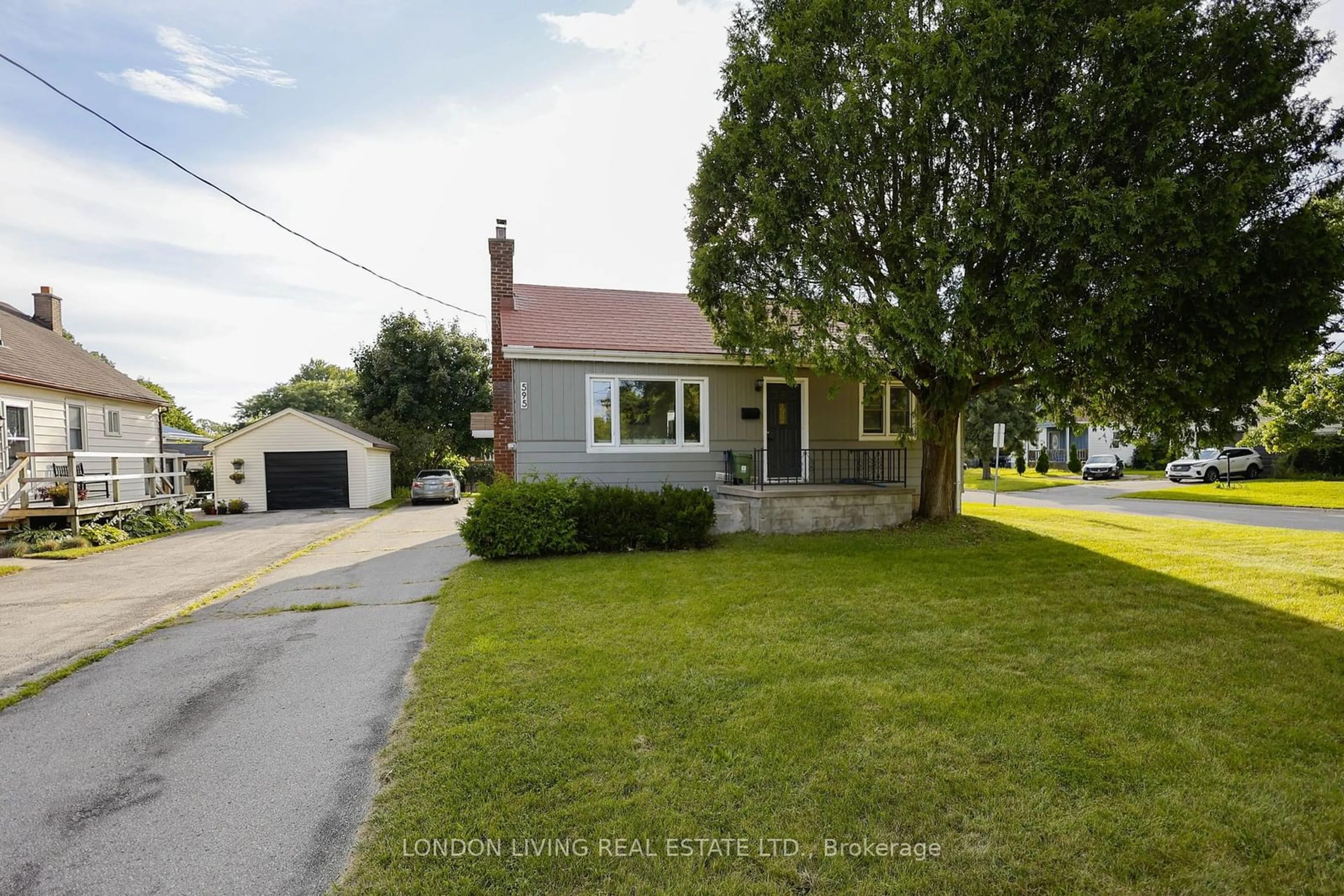 Frontside or backside of a home, the street view for 595 First St, London Ontario N5V 1Z9