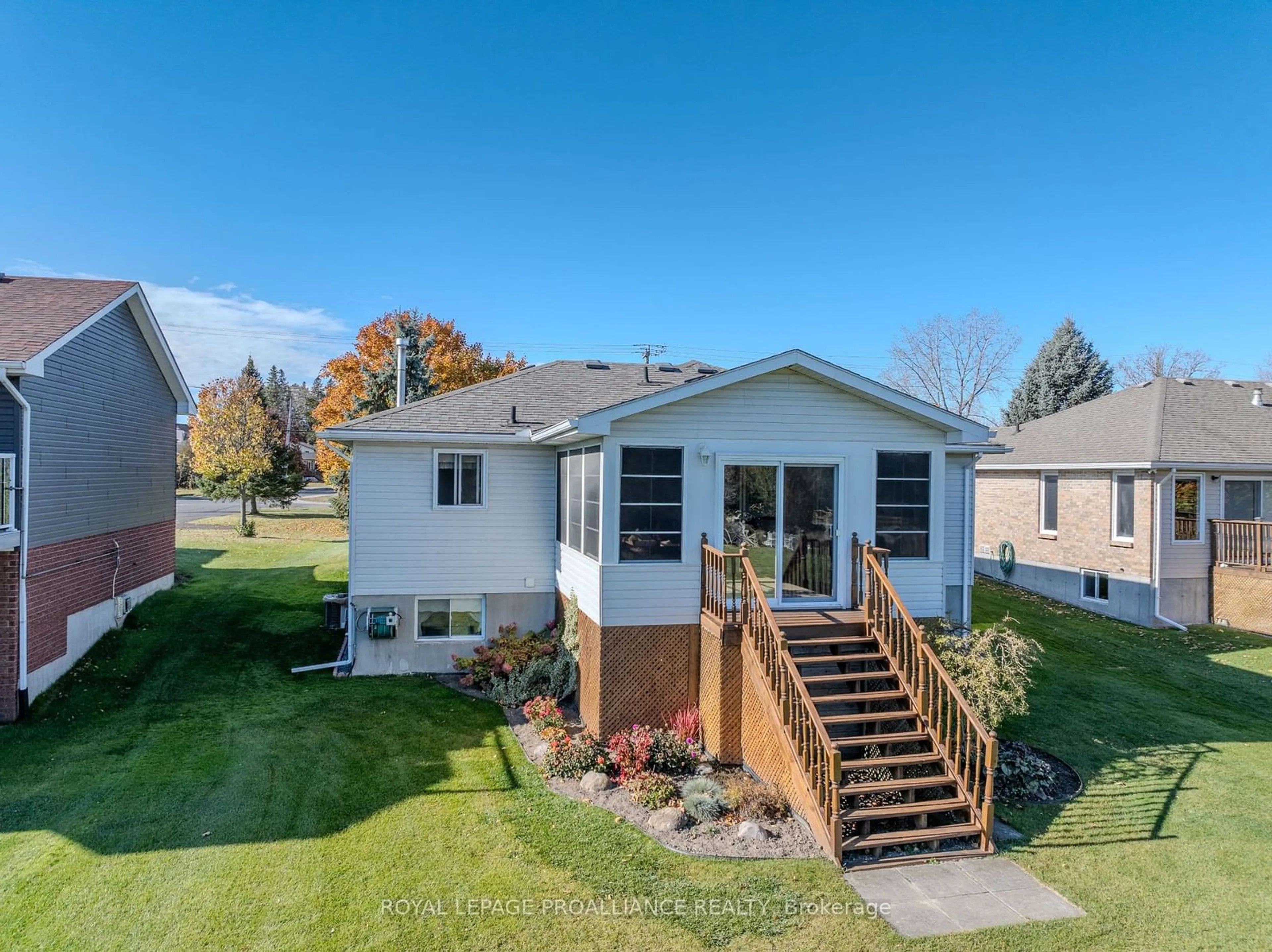 Frontside or backside of a home, the fenced backyard for 244 North Trent St, Quinte West Ontario K0K 2C0