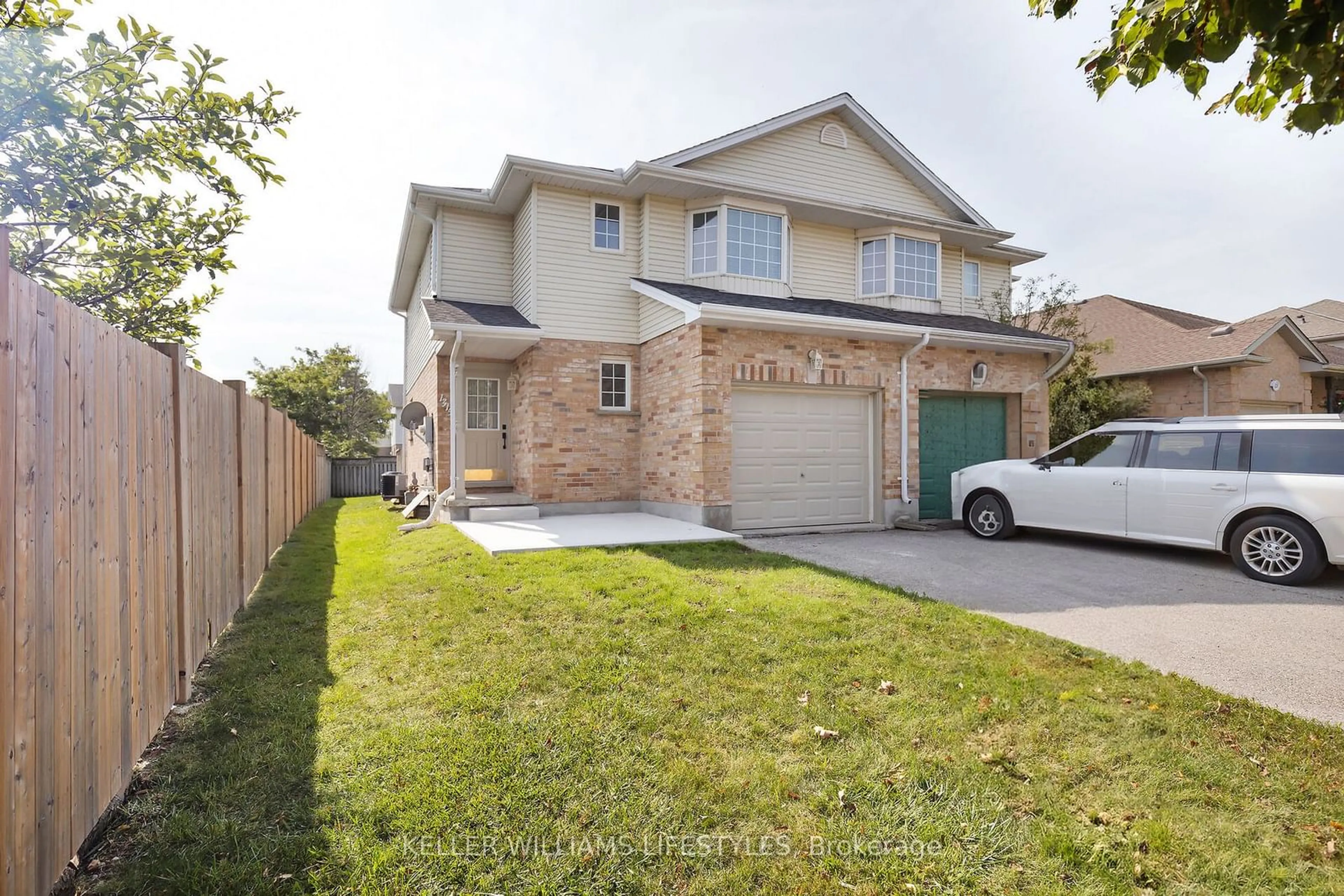 Frontside or backside of a home, the fenced backyard for 1315 Reardon Blvd, London Ontario N6M 1B5