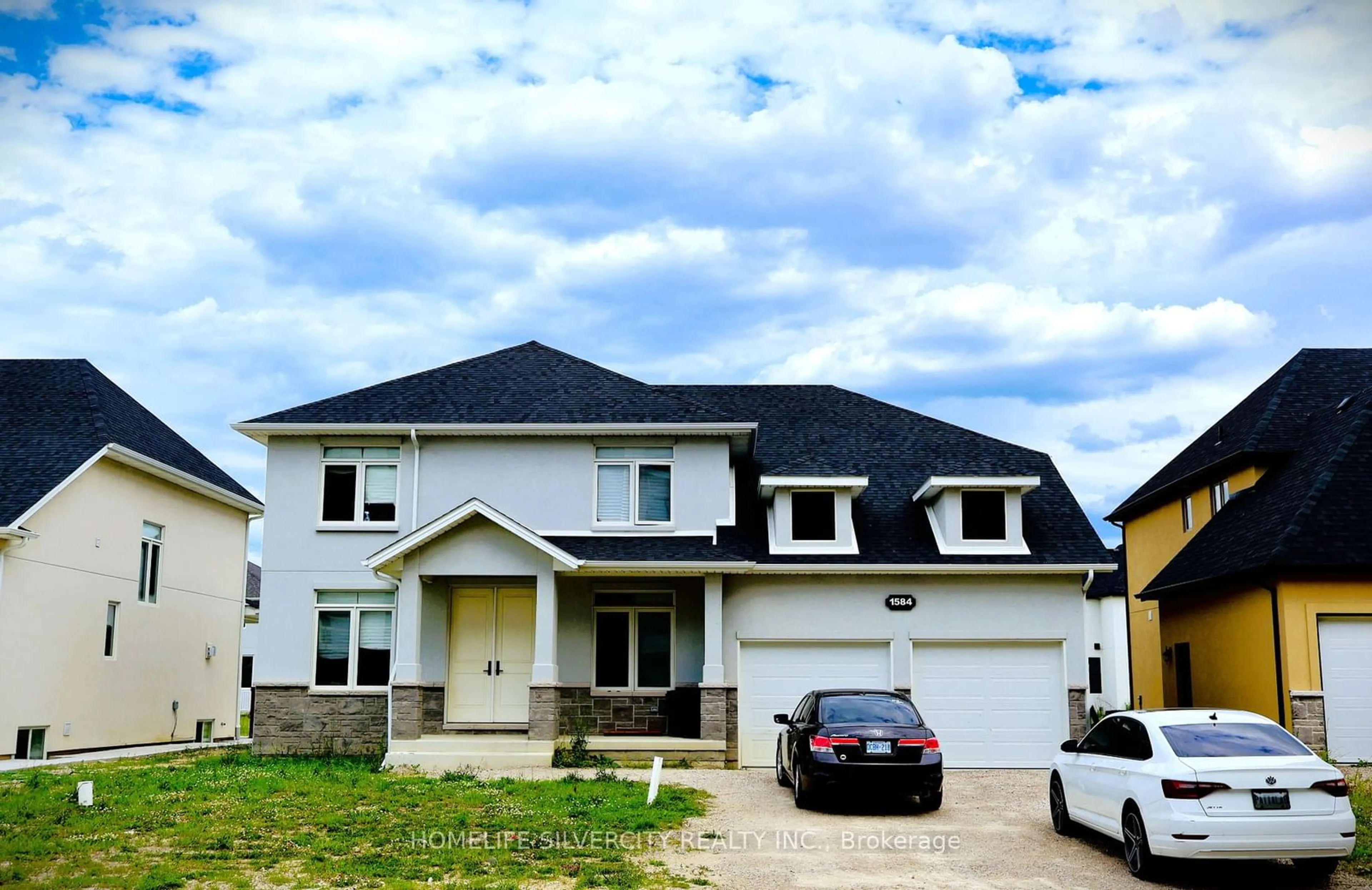 Frontside or backside of a home, the street view for 1584 Bowler Dr, Windsor Ontario N8S 0A9