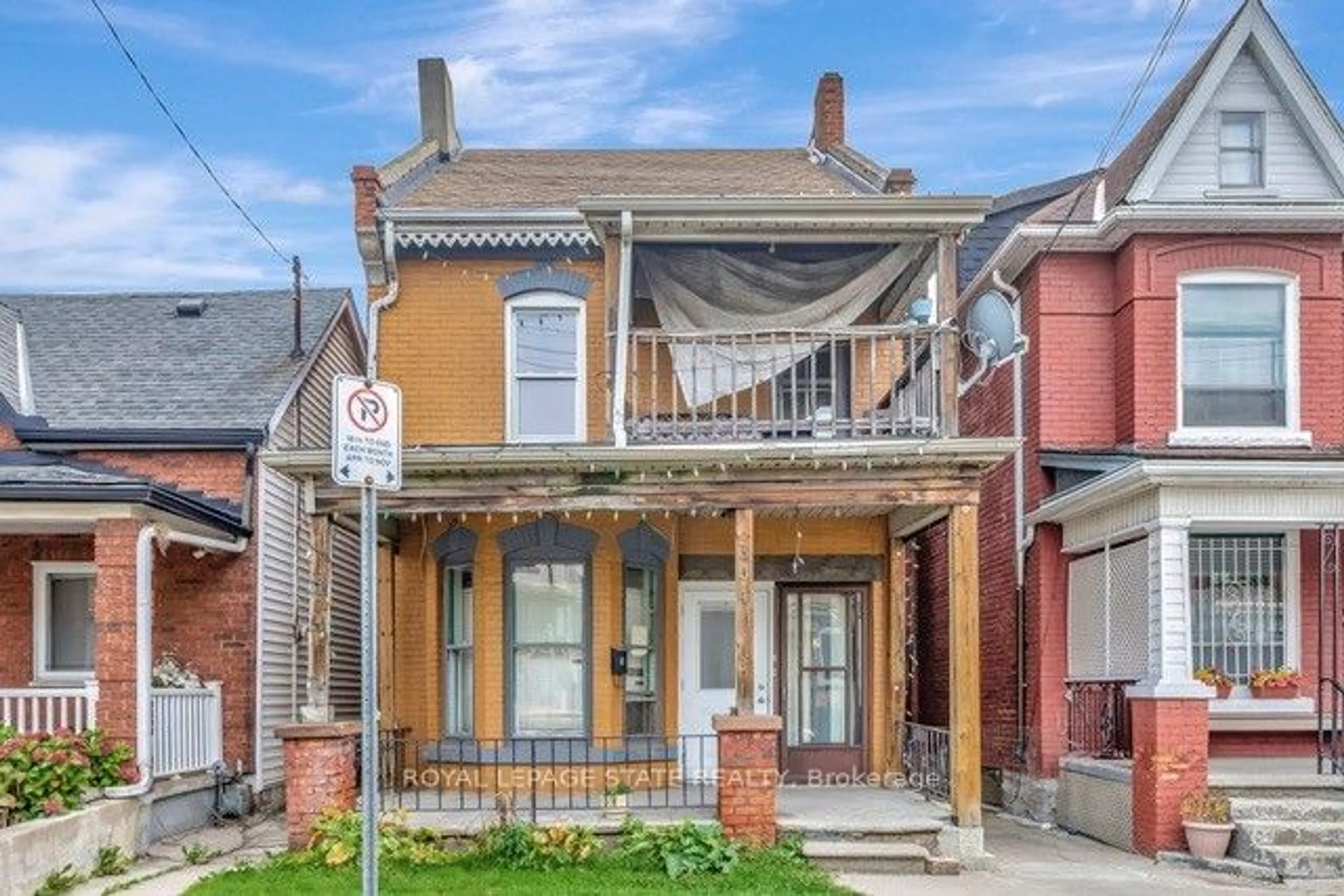 Frontside or backside of a home, the street view for 304 Emerald St, Hamilton Ontario L8L 5L3