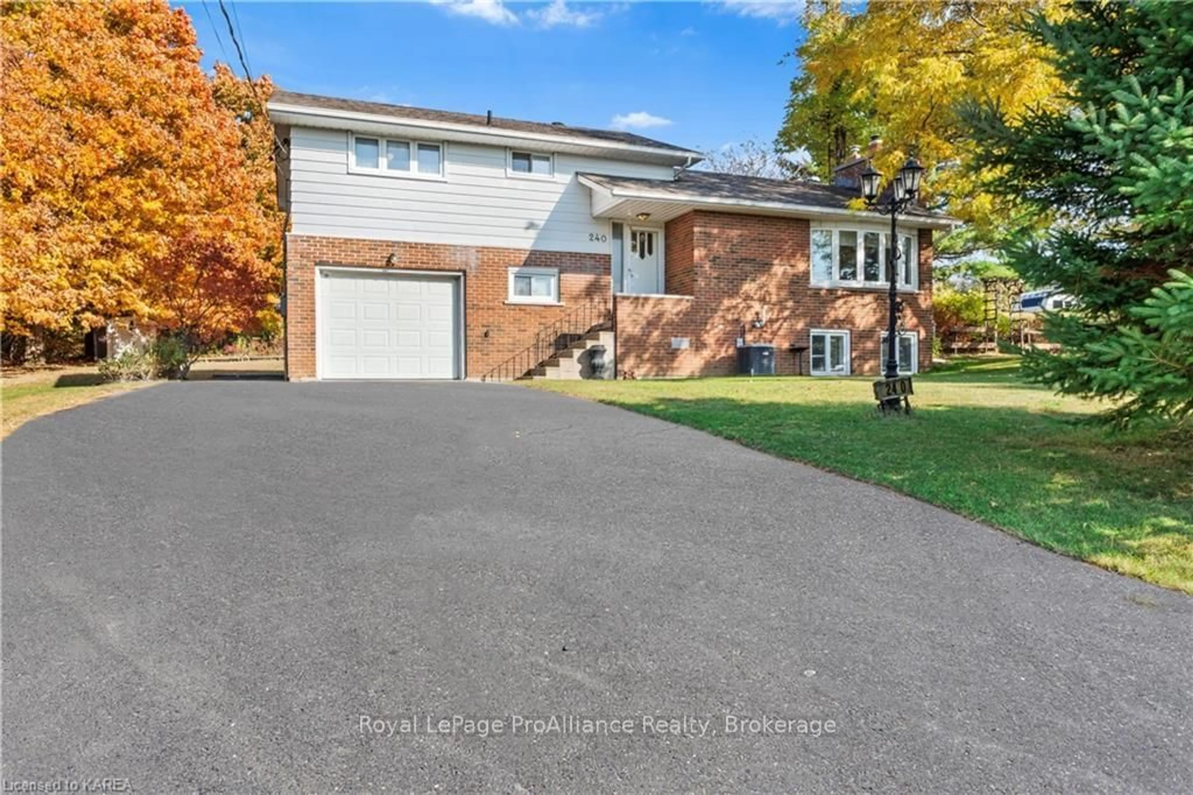 Frontside or backside of a home, the street view for 240 SOMERSET Dr, Loyalist Ontario K0H 1G0