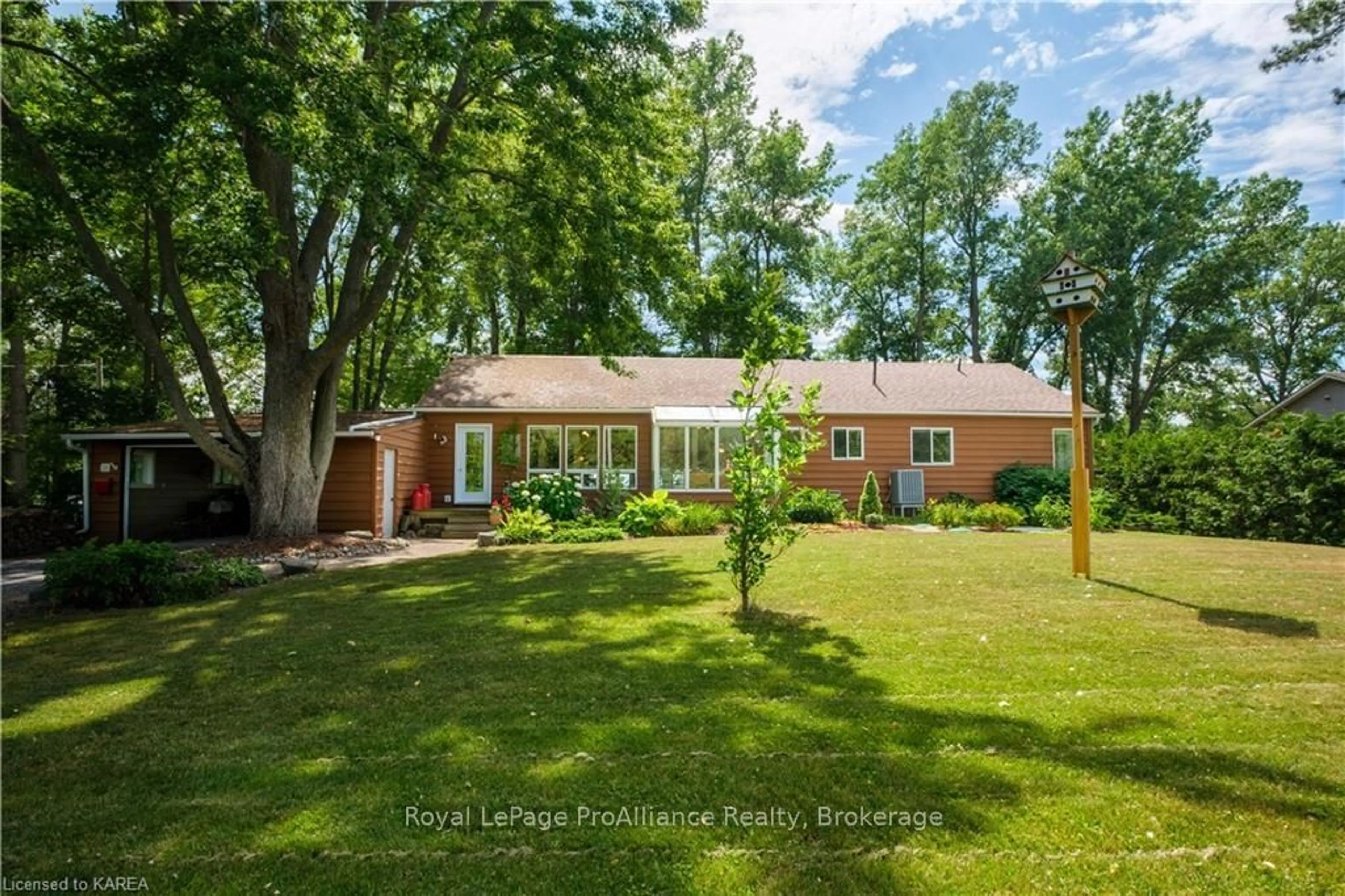 Frontside or backside of a home, the fenced backyard for 26 SUNSET Lane, Greater Napanee Ontario K7R 3K7