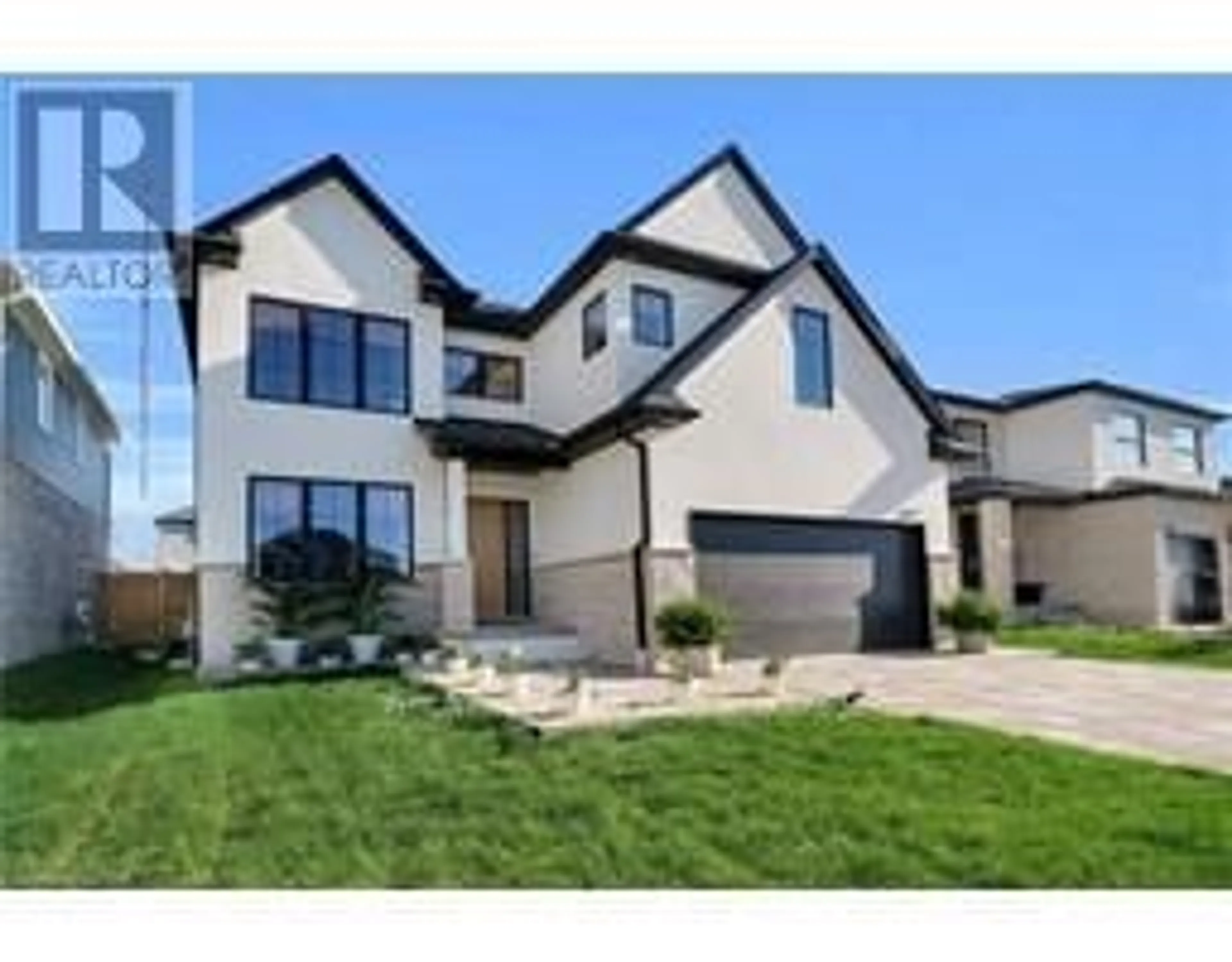 Frontside or backside of a home for 1877 TRAILSWAY Dr, London Ontario N6K 4X4