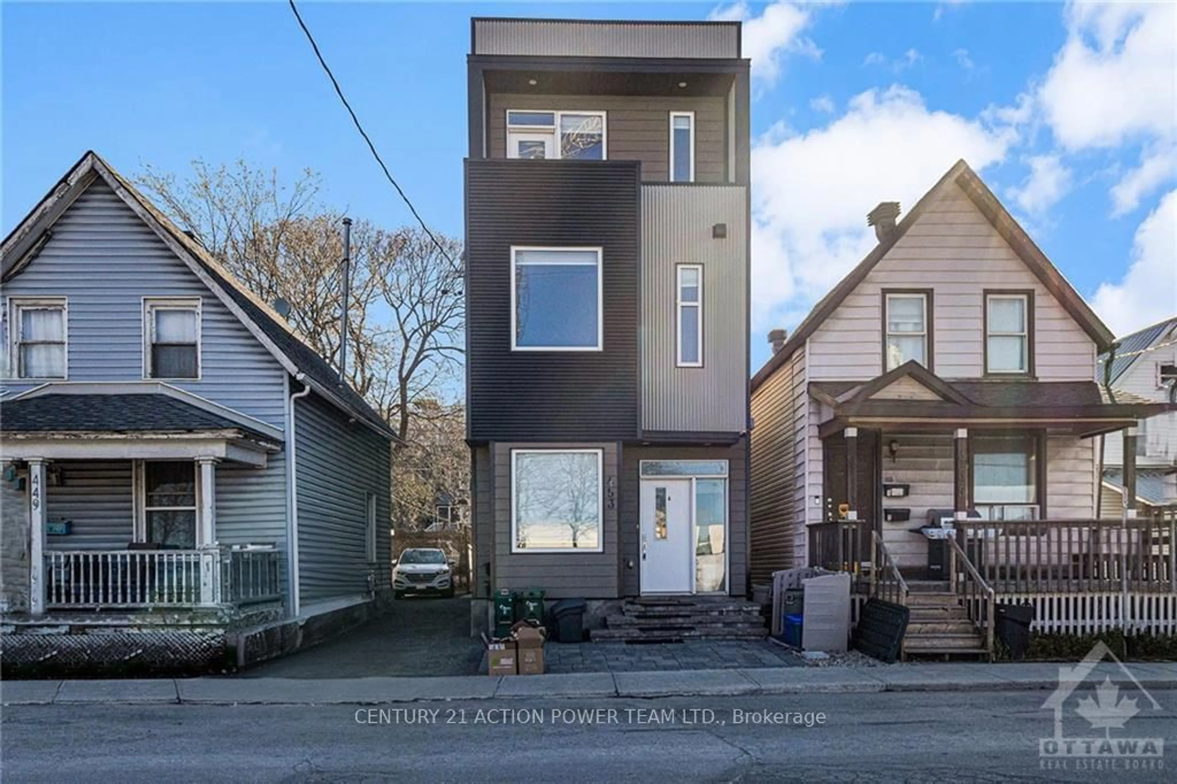 Frontside or backside of a home, the street view for 453 BOOTH St, West Centre Town Ontario K1R 7K9