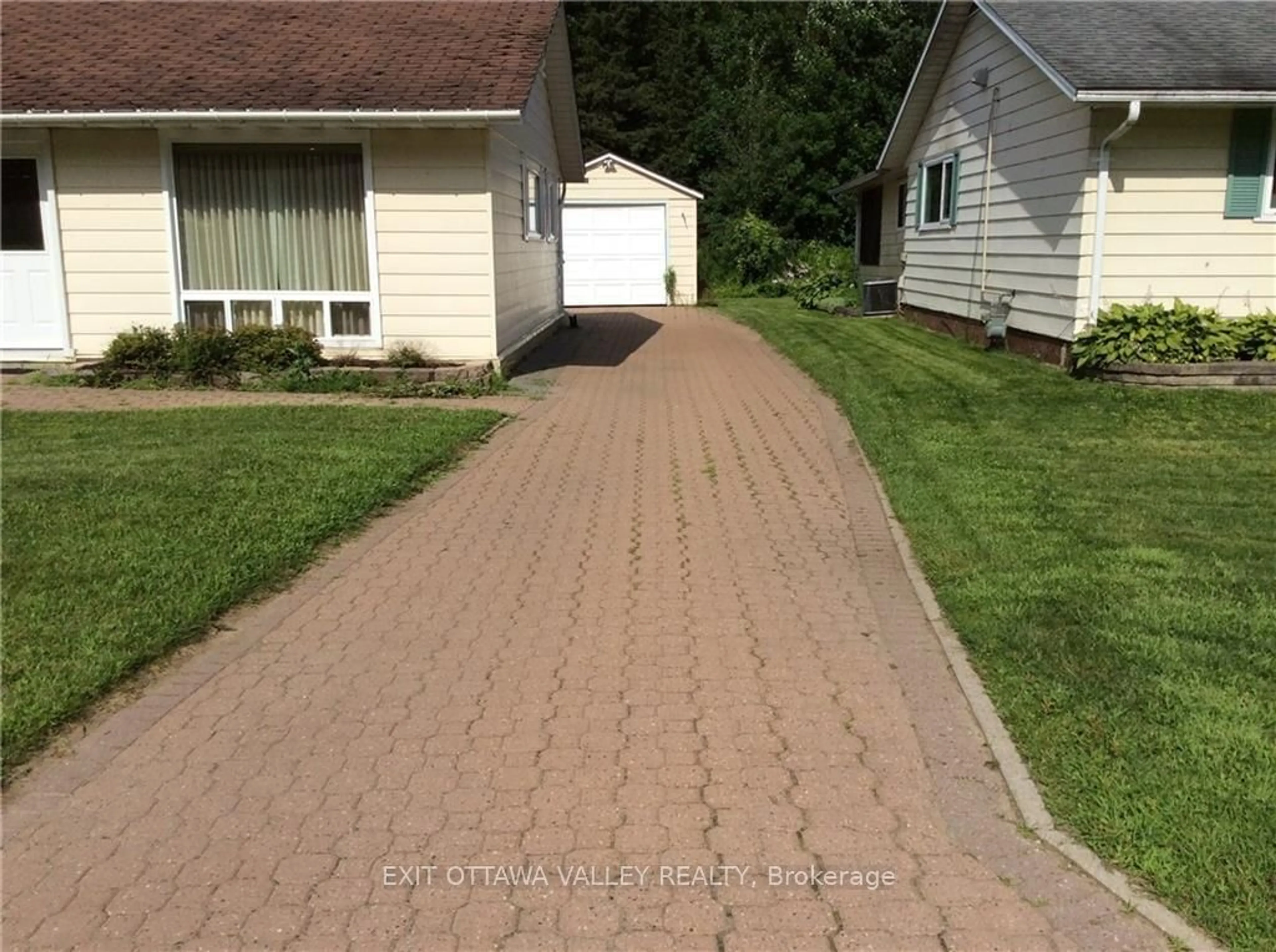 Frontside or backside of a home, the street view for 55 BEACH Ave, Deep River Ontario K0J 1P0