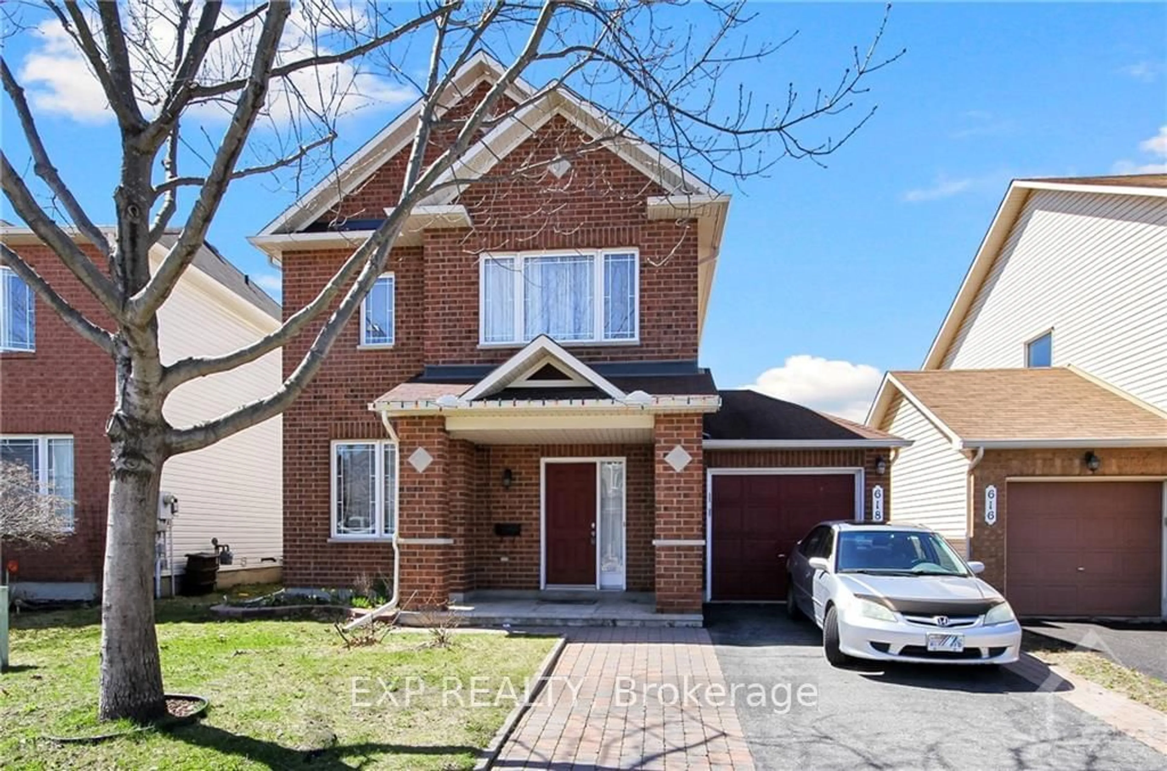 Home with brick exterior material for 618 BEATRICE Dr, Barrhaven Ontario K2J 5N9