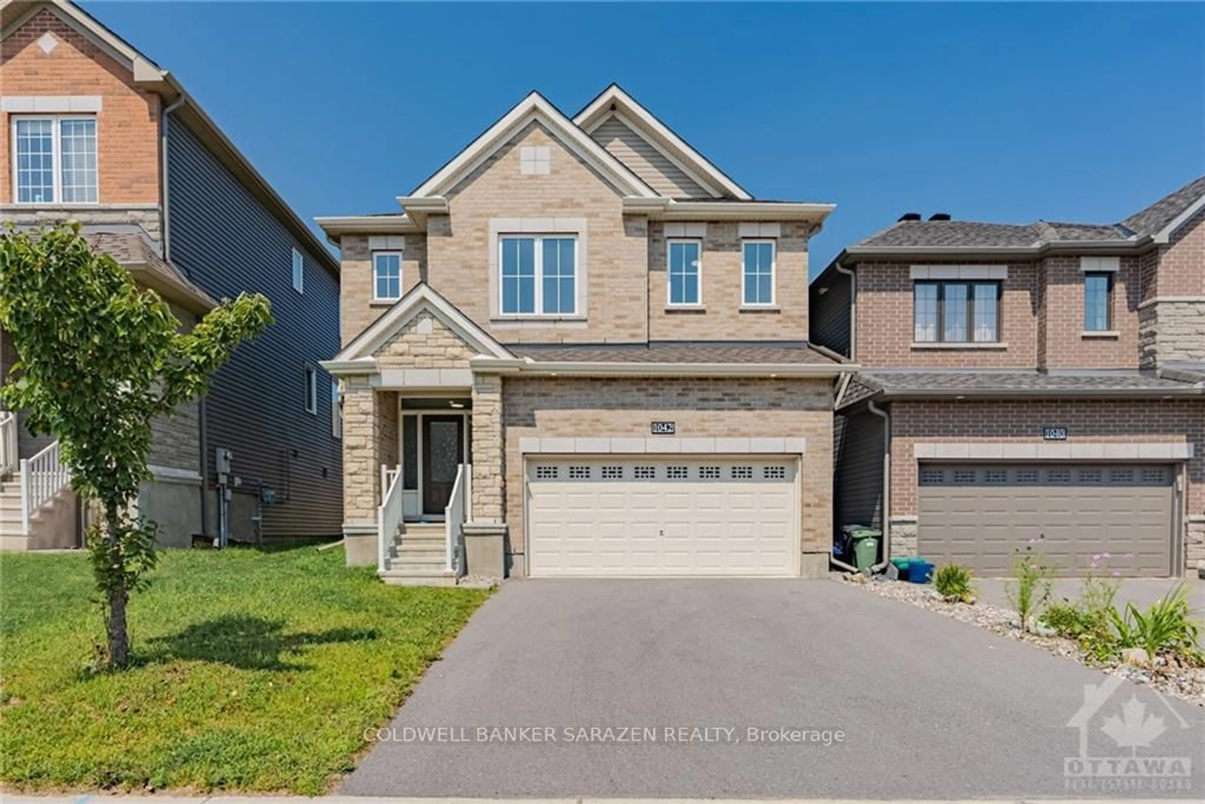 Frontside or backside of a home, the street view for 1042 KILBIRNIE Dr, Barrhaven Ontario K2J 6S3