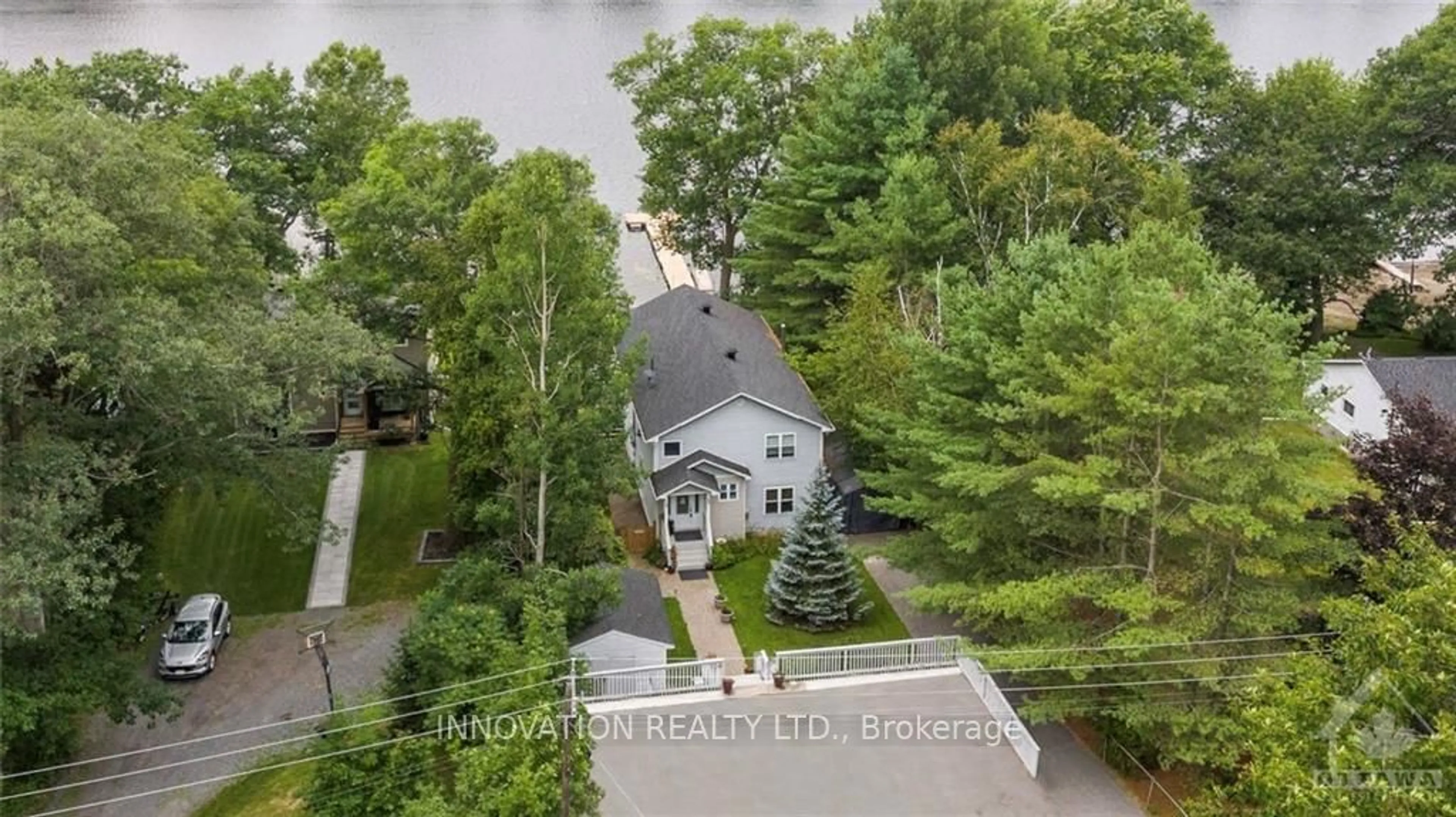 A pic from exterior of the house or condo, the street view for 1206 BAYVIEW Dr, Constance Bay - Dunrobin - Kilmaurs - Woodlawn Ontario K0A 3M0