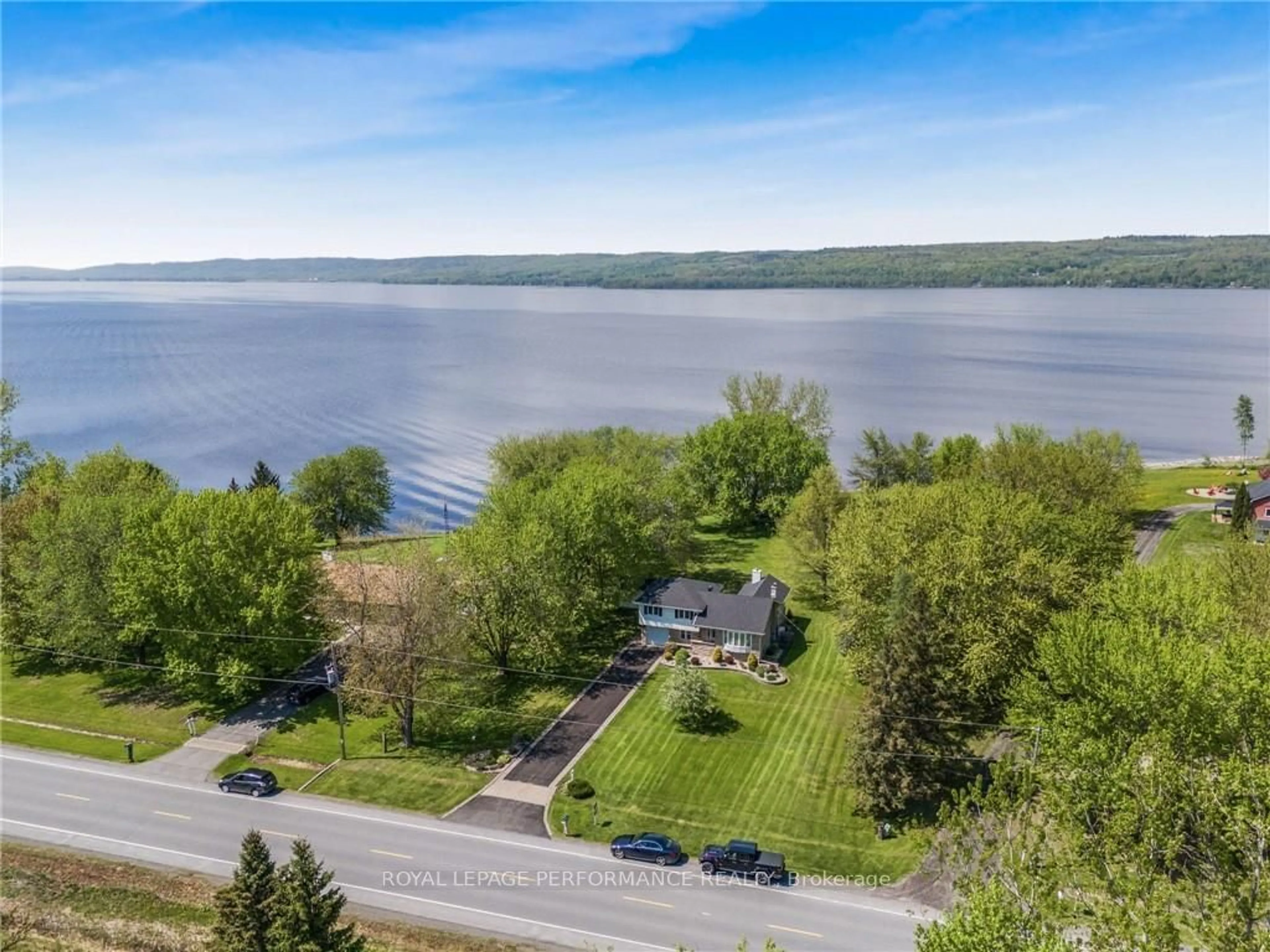 A pic from outside/outdoor area/front of a property/back of a property/a pic from drone, water/lake/river/ocean view for 1192 BAY Rd, Champlain Ontario K0B 1K0