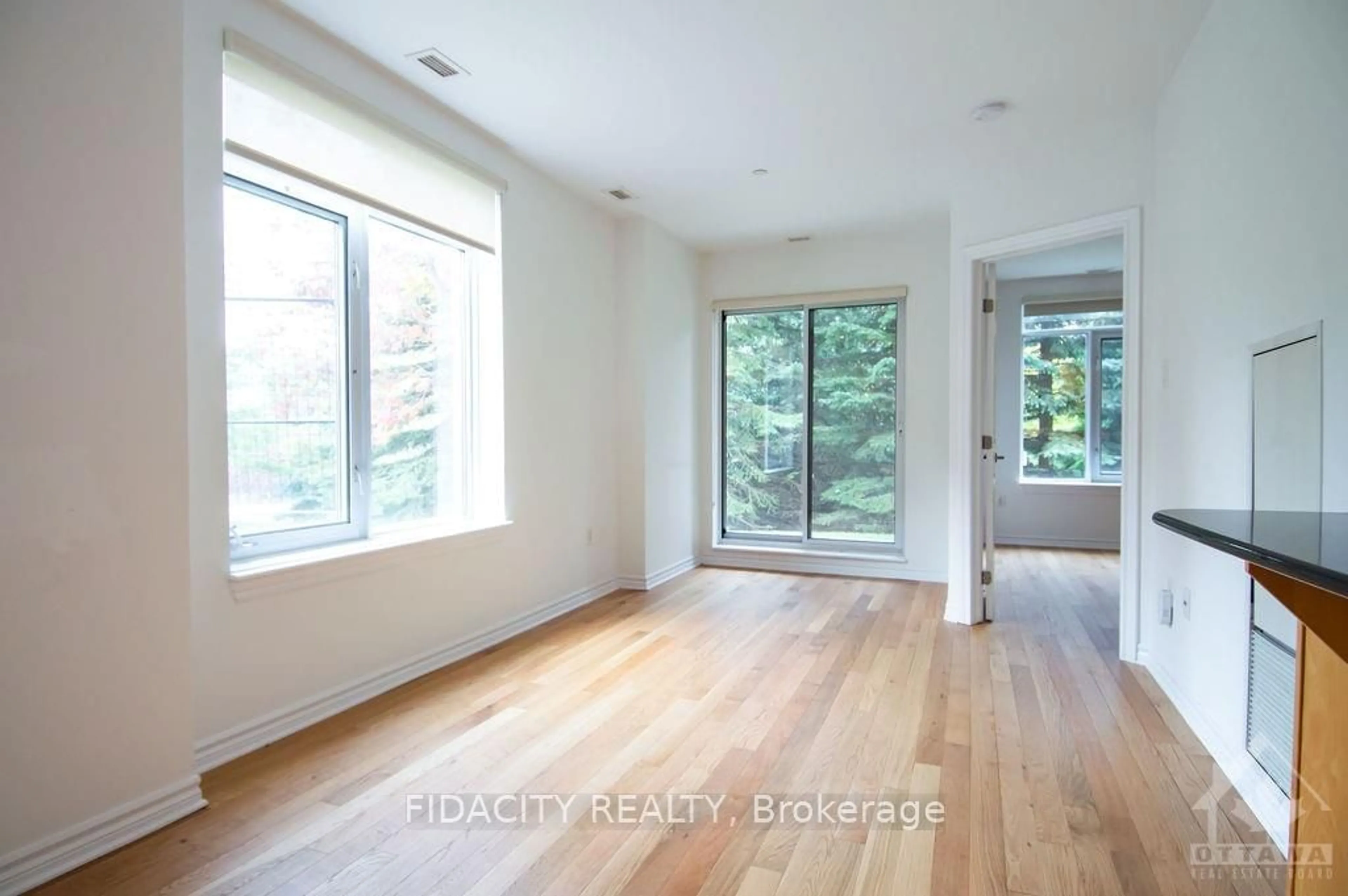 A pic of a room, wood floors for 314 CENTRAL PARK Dr #101, Carlington - Central Park Ontario K2C 4G4