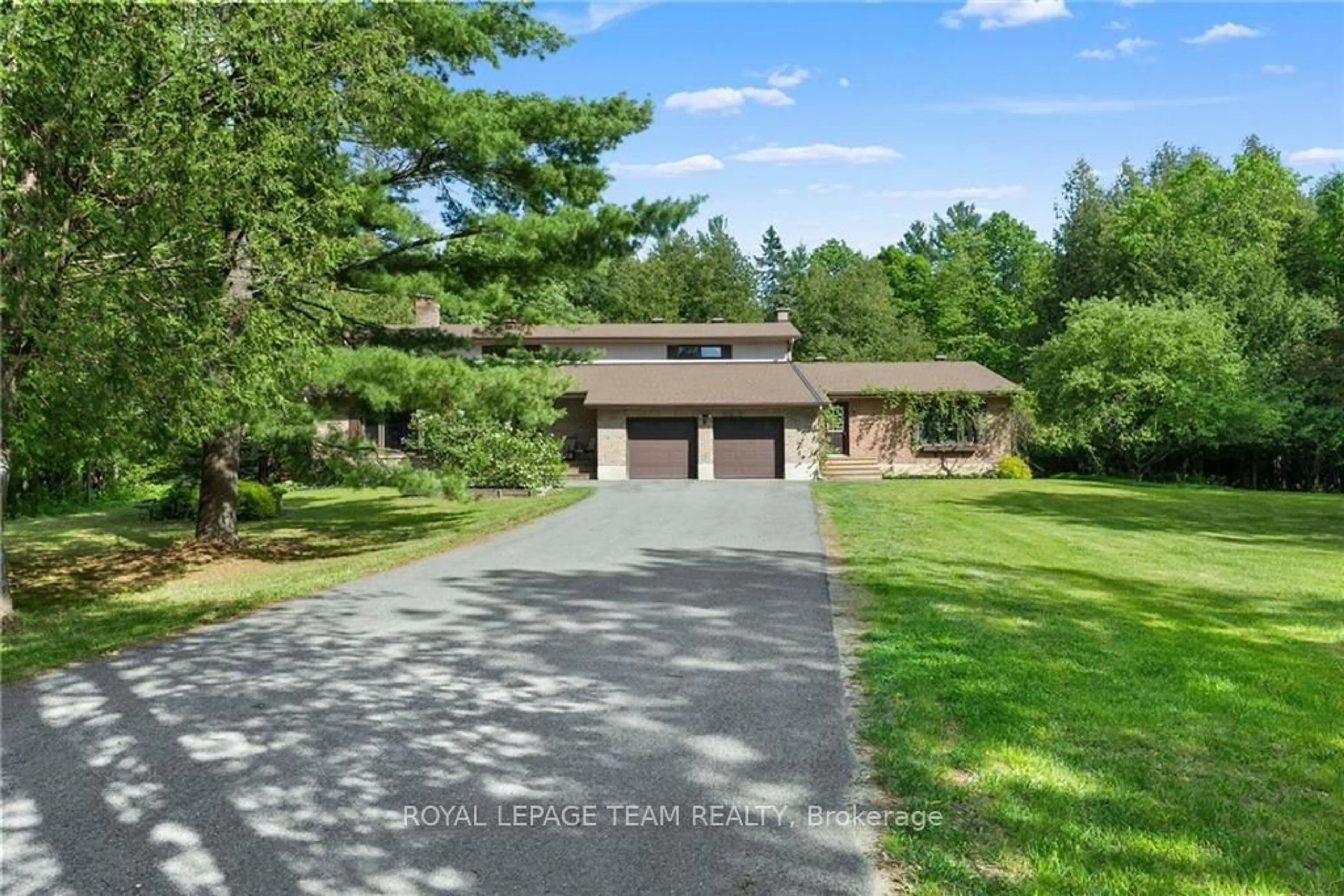 Frontside or backside of a home, the street view for 132 MANION Rd, Carp - Huntley Ward Ontario K0A 1L0