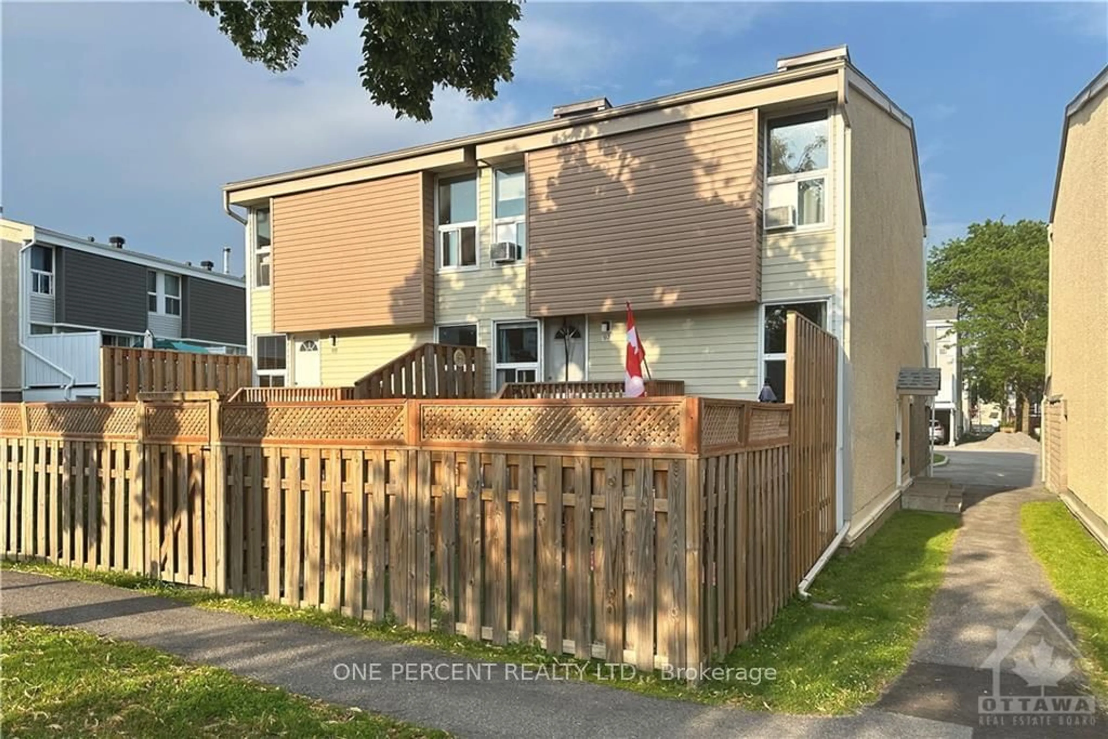 A pic from exterior of the house or condo, the fenced backyard for 3415 UPLANDS Dr #97, Hunt Club - Windsor Park Village and Area Ontario K1V 9M3