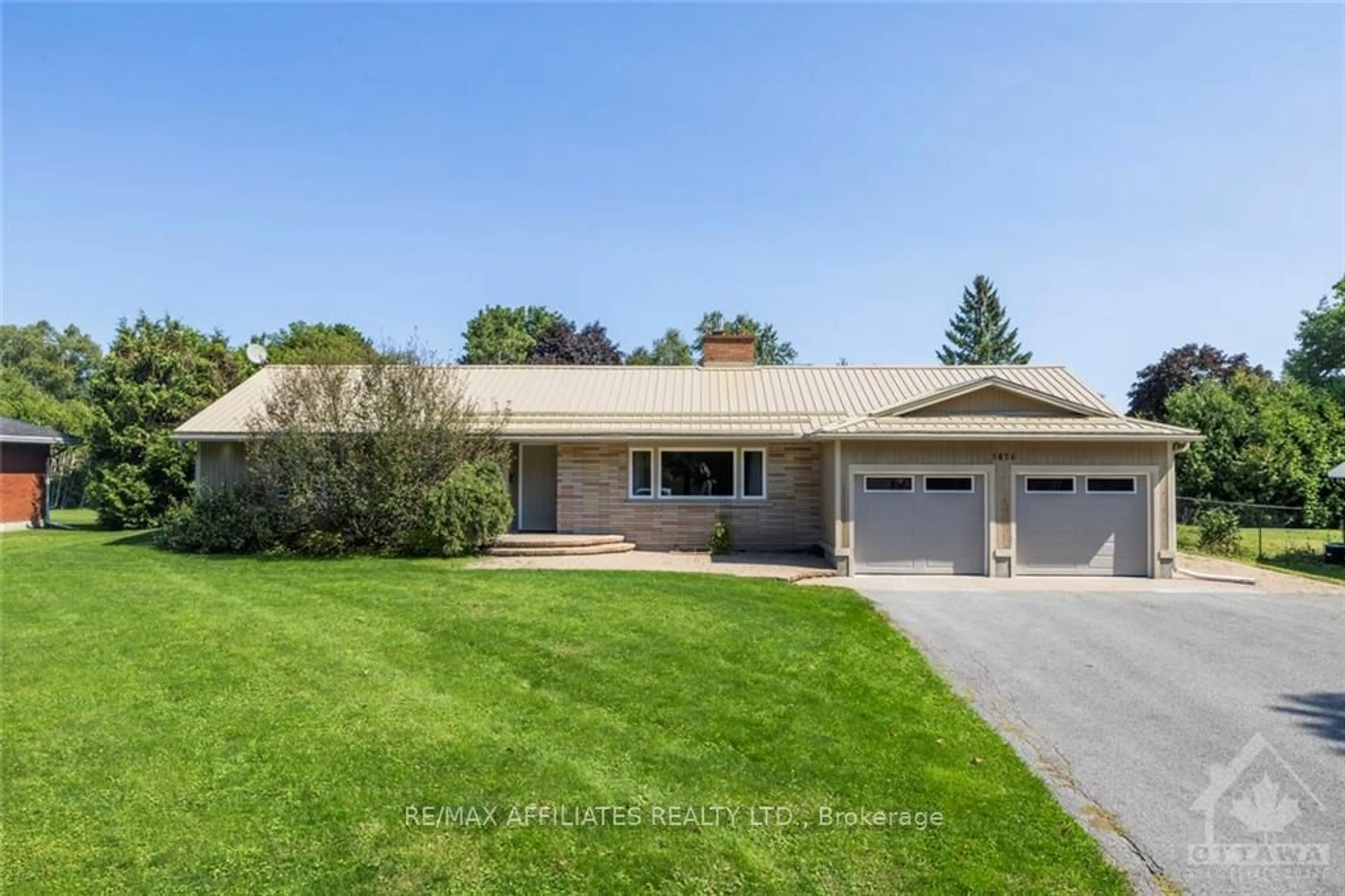 Frontside or backside of a home, the street view for 3874 CARP Rd, Carp - Huntley Ward Ontario K0A 1L0