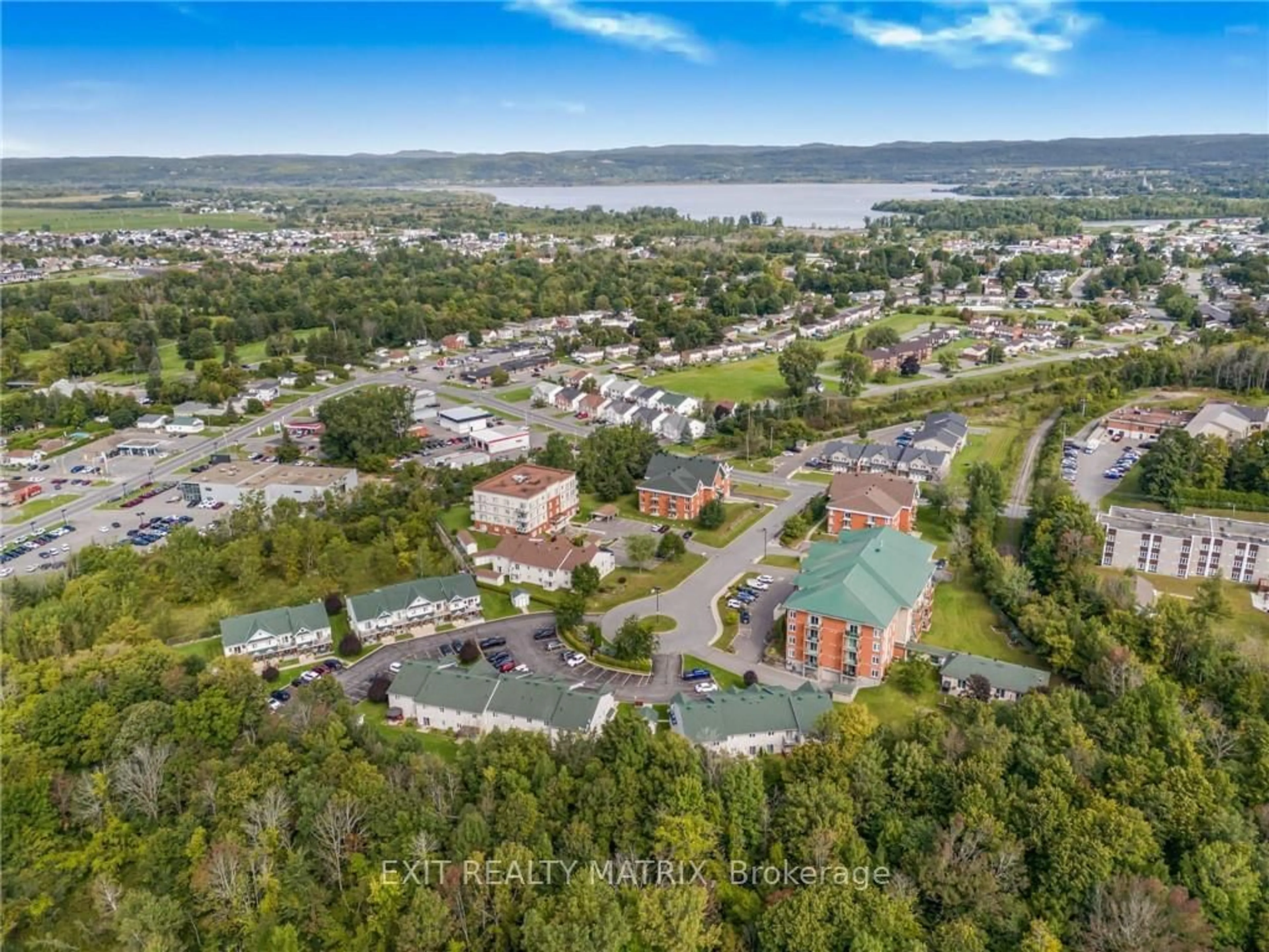 A pic from outside/outdoor area/front of a property/back of a property/a pic from drone, unknown for 1404 CLEMENT St #114, Hawkesbury Ontario K6A 3V6