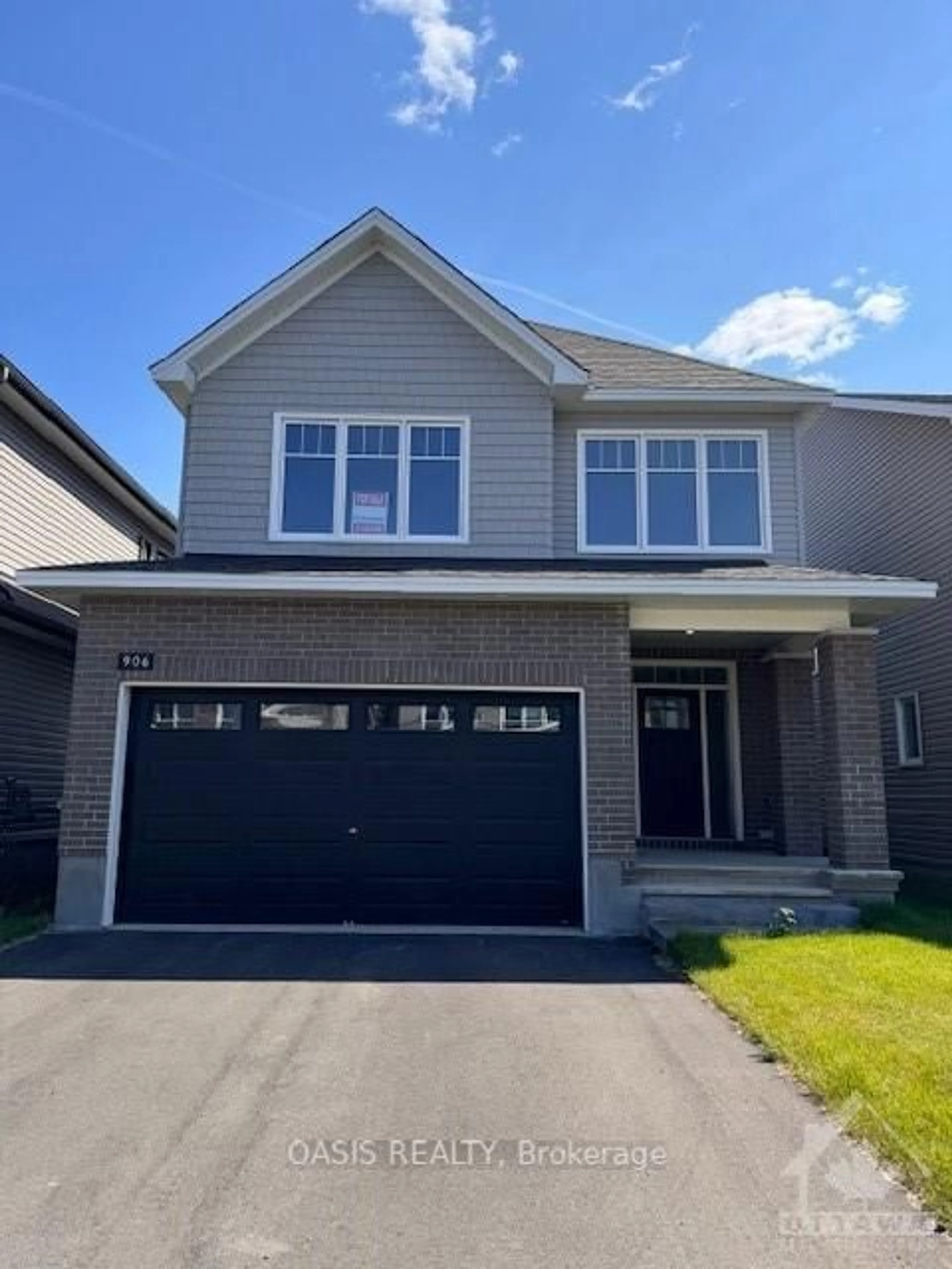 Home with brick exterior material, street for 906 ECHINACEA Row, Barrhaven Ontario K2J 7A4