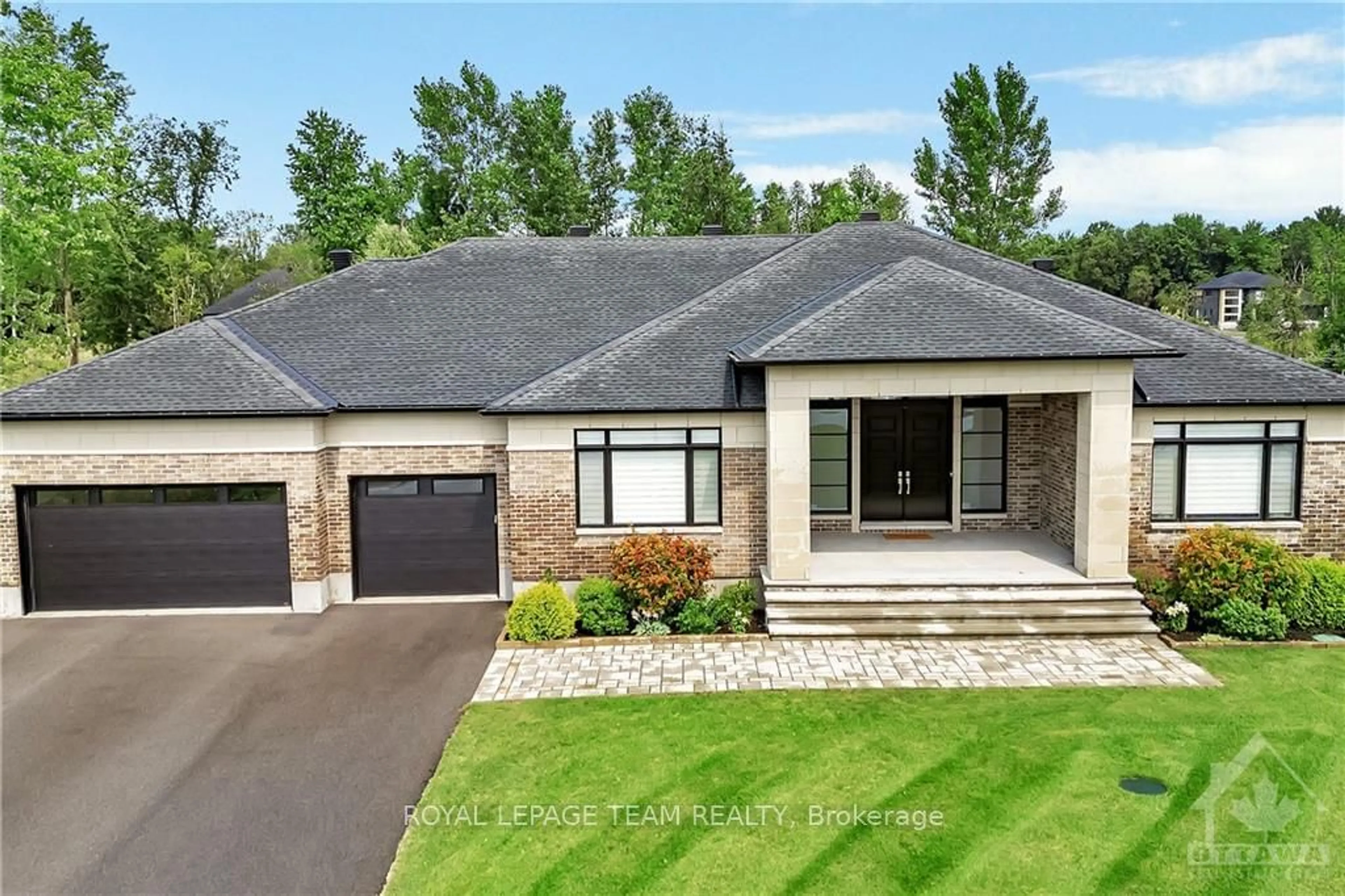 Frontside or backside of a home, cottage for 700 MCMANUS Ave, Manotick - Kars - Rideau Twp and Area Ontario K4M 0B2