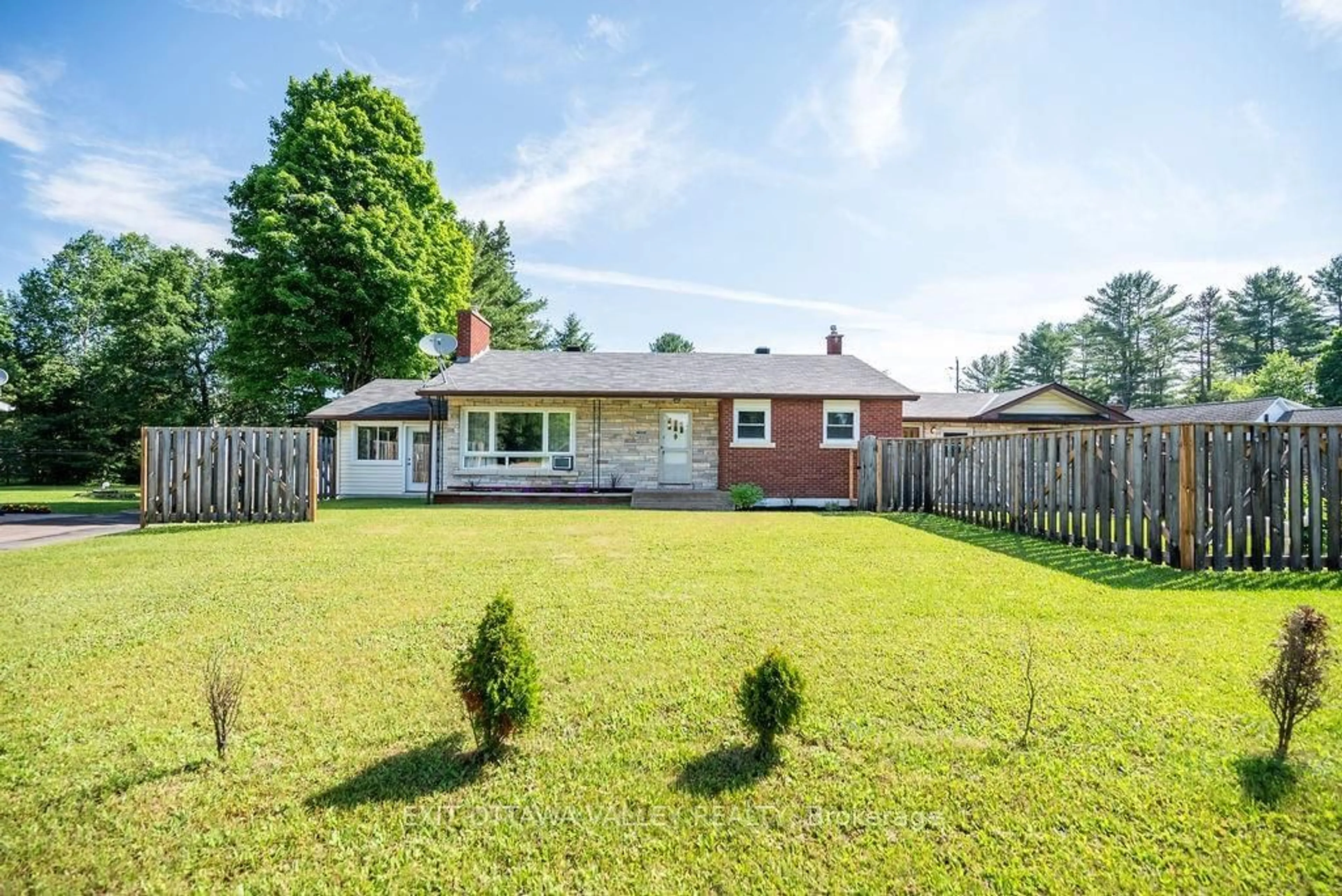 Frontside or backside of a home, the fenced backyard for 33486 HIGHWAY 17, Deep River Ontario K0J 1P0