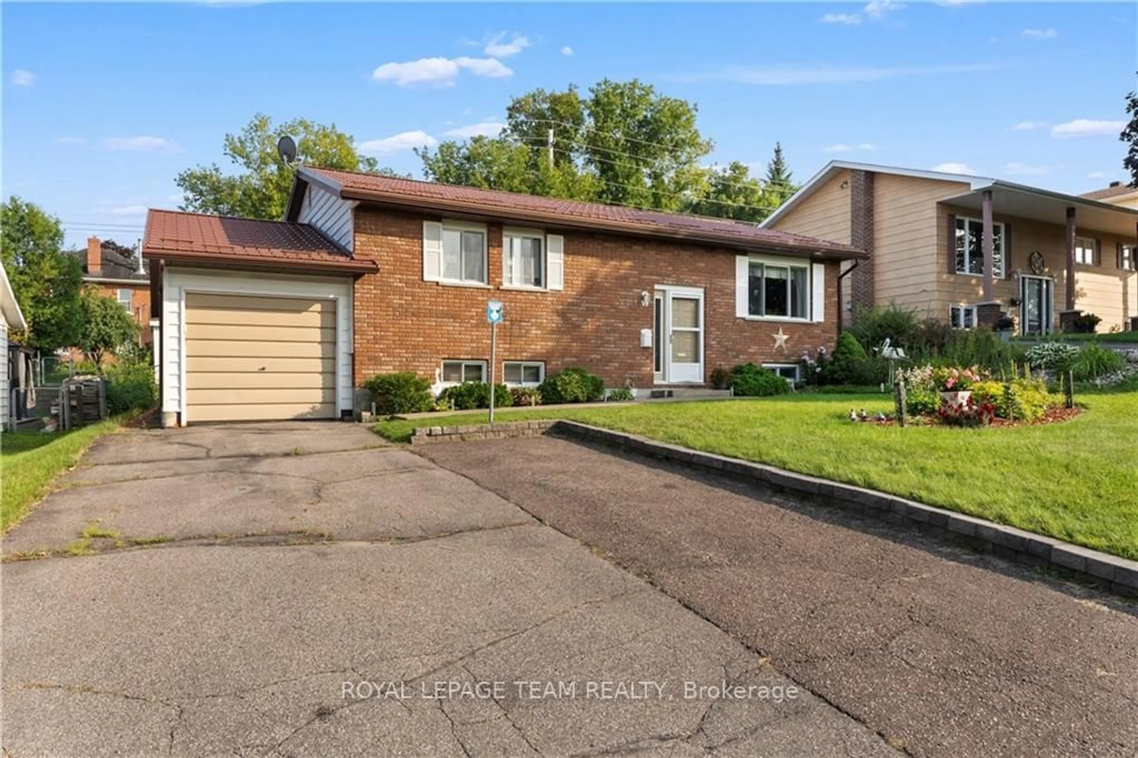 Frontside or backside of a home, the street view for 99 IVY Ave, Renfrew Ontario K7V 4C9