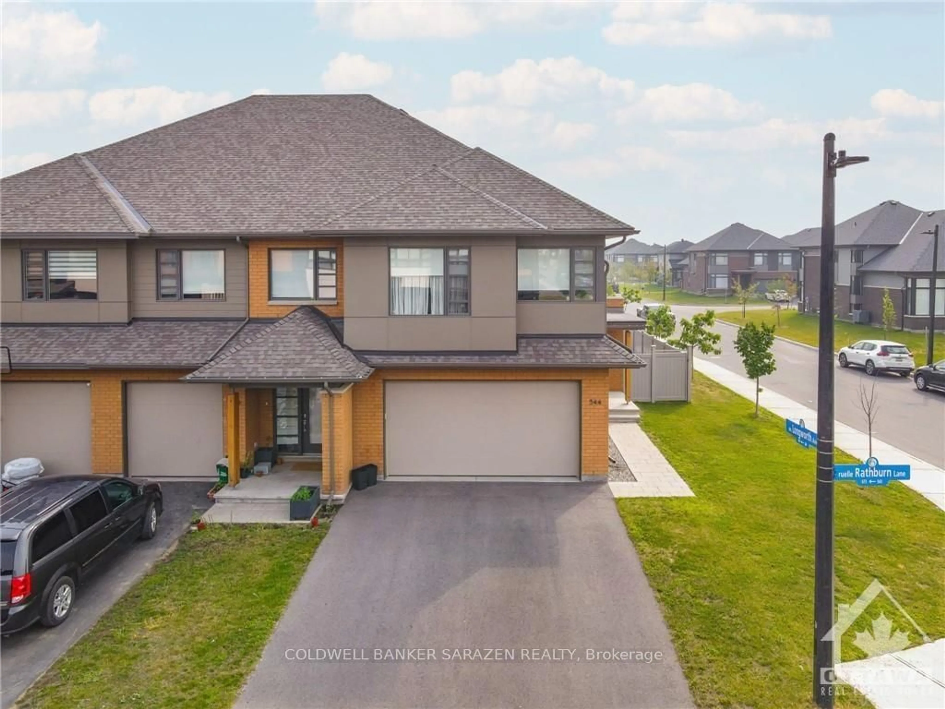 Frontside or backside of a home, the street view for 544 RATHBURN Lane, Leitrim Ontario K1T 0T3