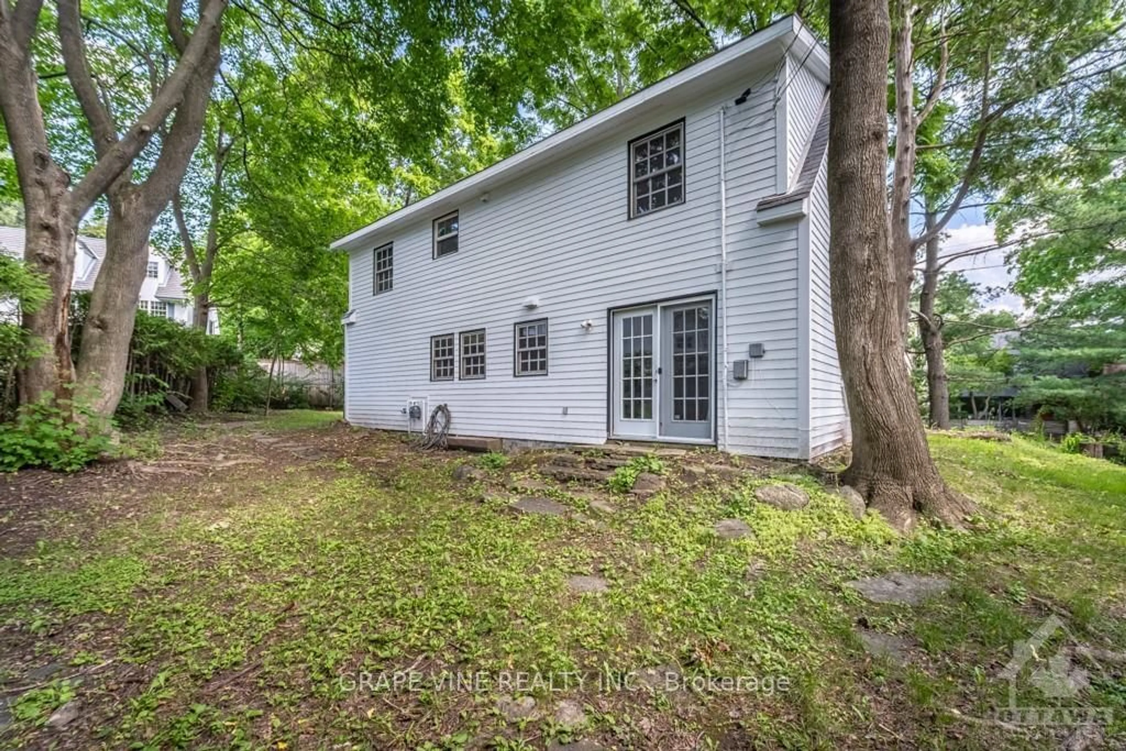 Frontside or backside of a home, the fenced backyard for 181 MAPLE Lane, Rockcliffe Park Ontario K1M 1G6