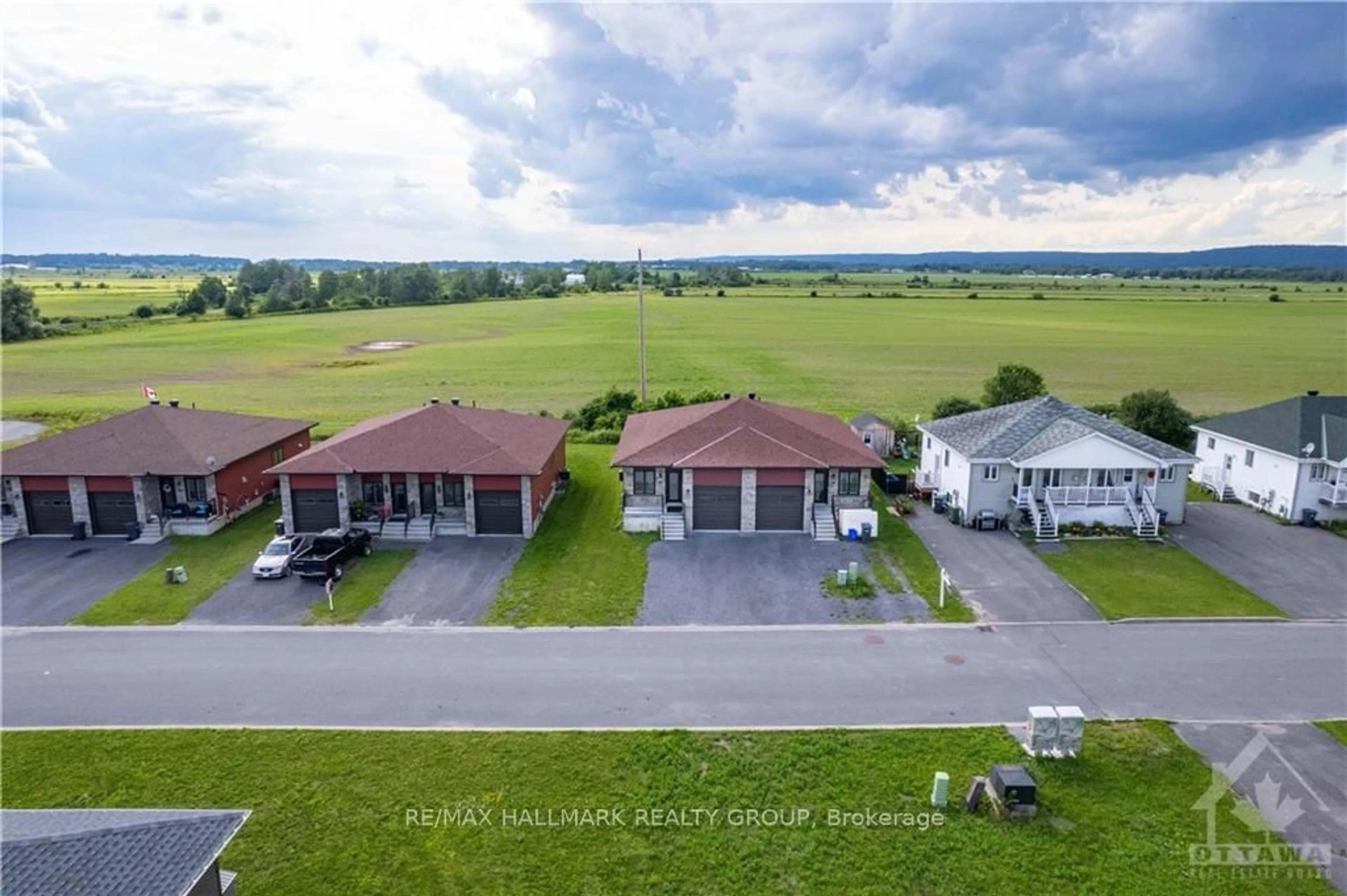 Frontside or backside of a home, the fenced backyard for 1031 JACYNTHE St, Hawkesbury Ontario K6A 3V9