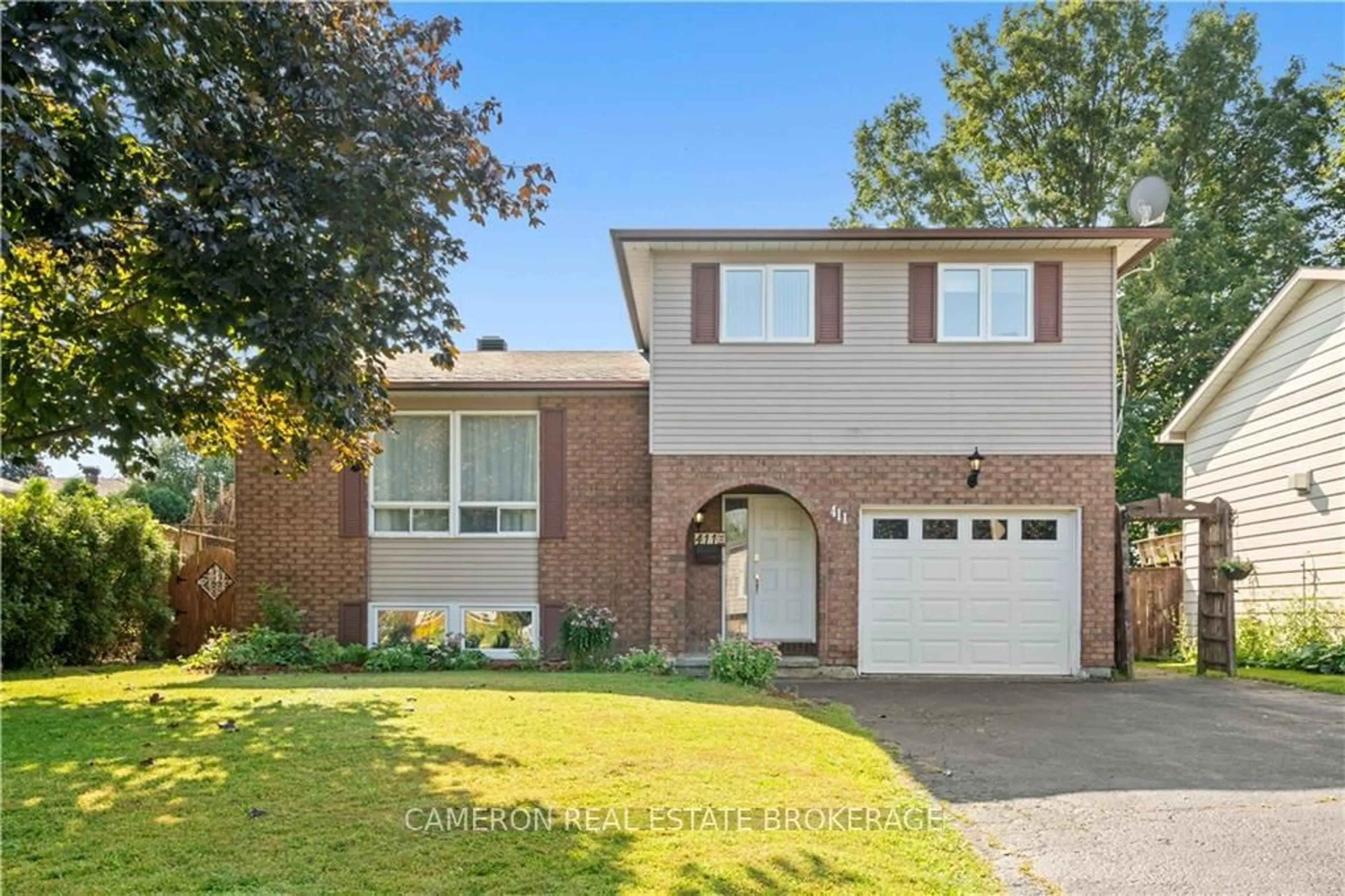 Home with brick exterior material for 411 MEADOWVALE Cres, Cornwall Ontario K6J 5M7