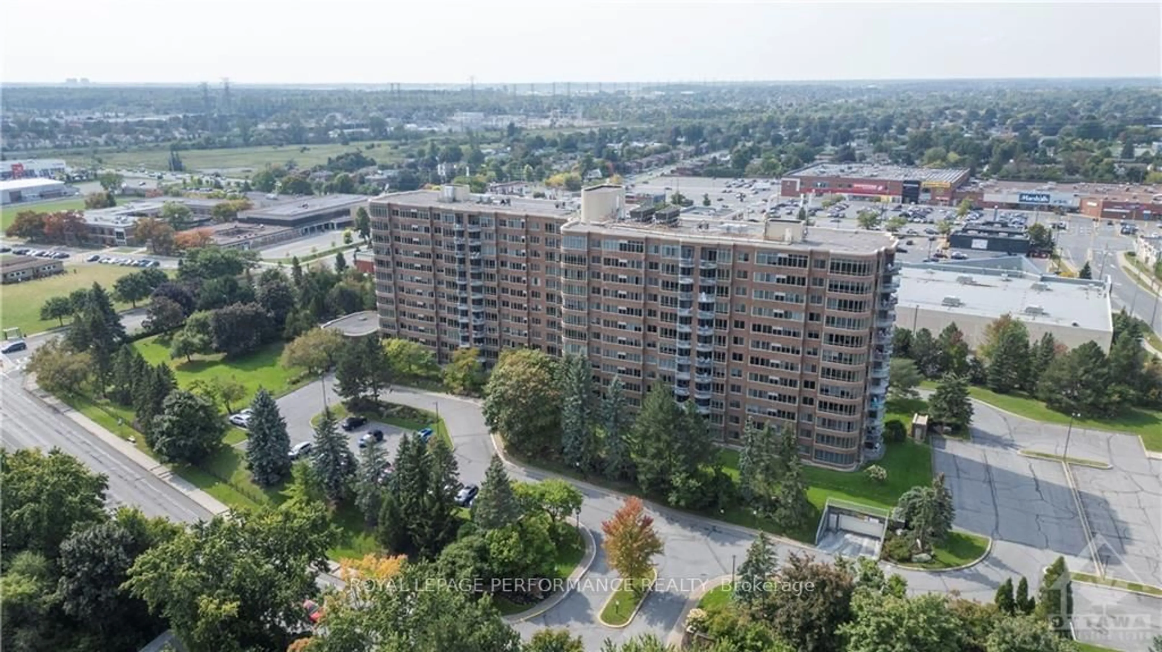 A pic from exterior of the house or condo, the view of city buildings for 100 GRANT CARMAN Dr #116, Cityview - Parkwoods Hills - Rideau Shore Ontario K2E 8B8