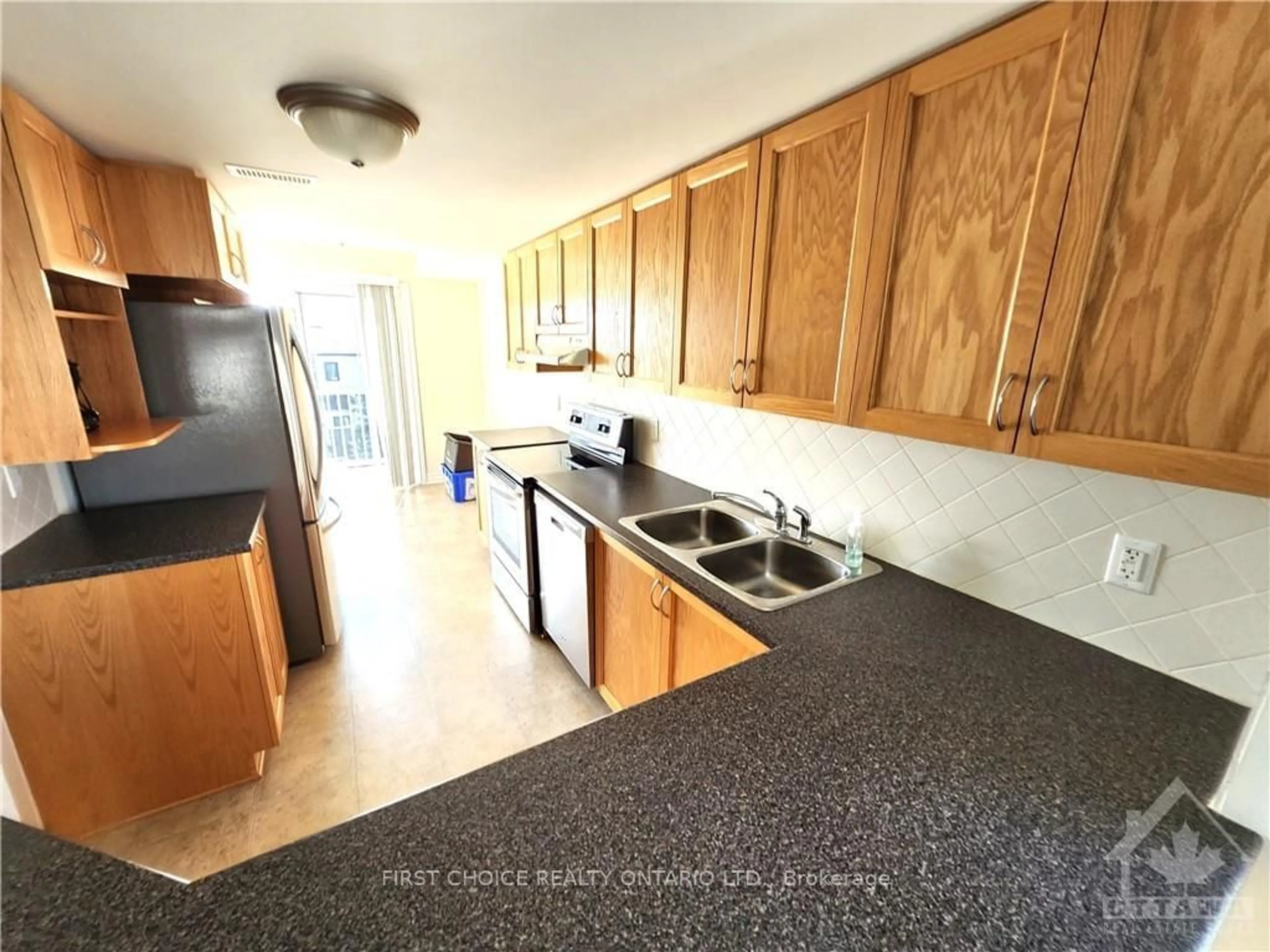 Standard kitchen, wood floors for 750 CHAPMAN MILLS Dr, Barrhaven Ontario K2J 3V2