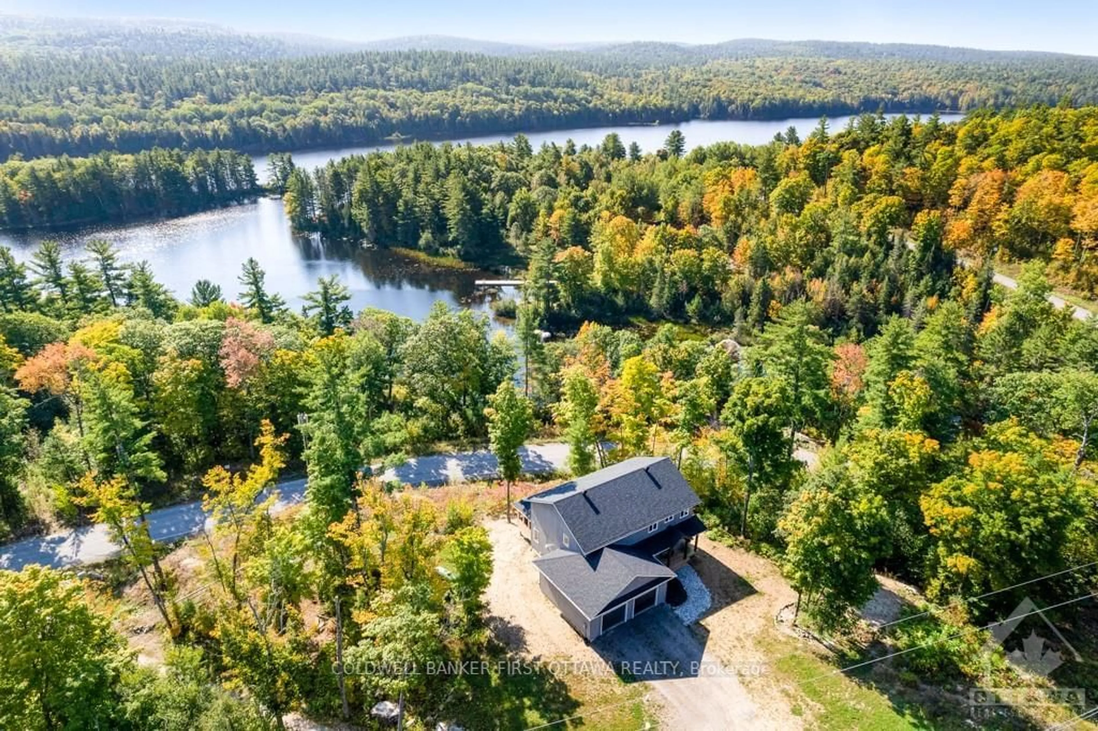 A pic from outside/outdoor area/front of a property/back of a property/a pic from drone, water/lake/river/ocean view for 1074 BARRETT CHUTE Rd, Greater Madawaska Ontario K0J 1H0