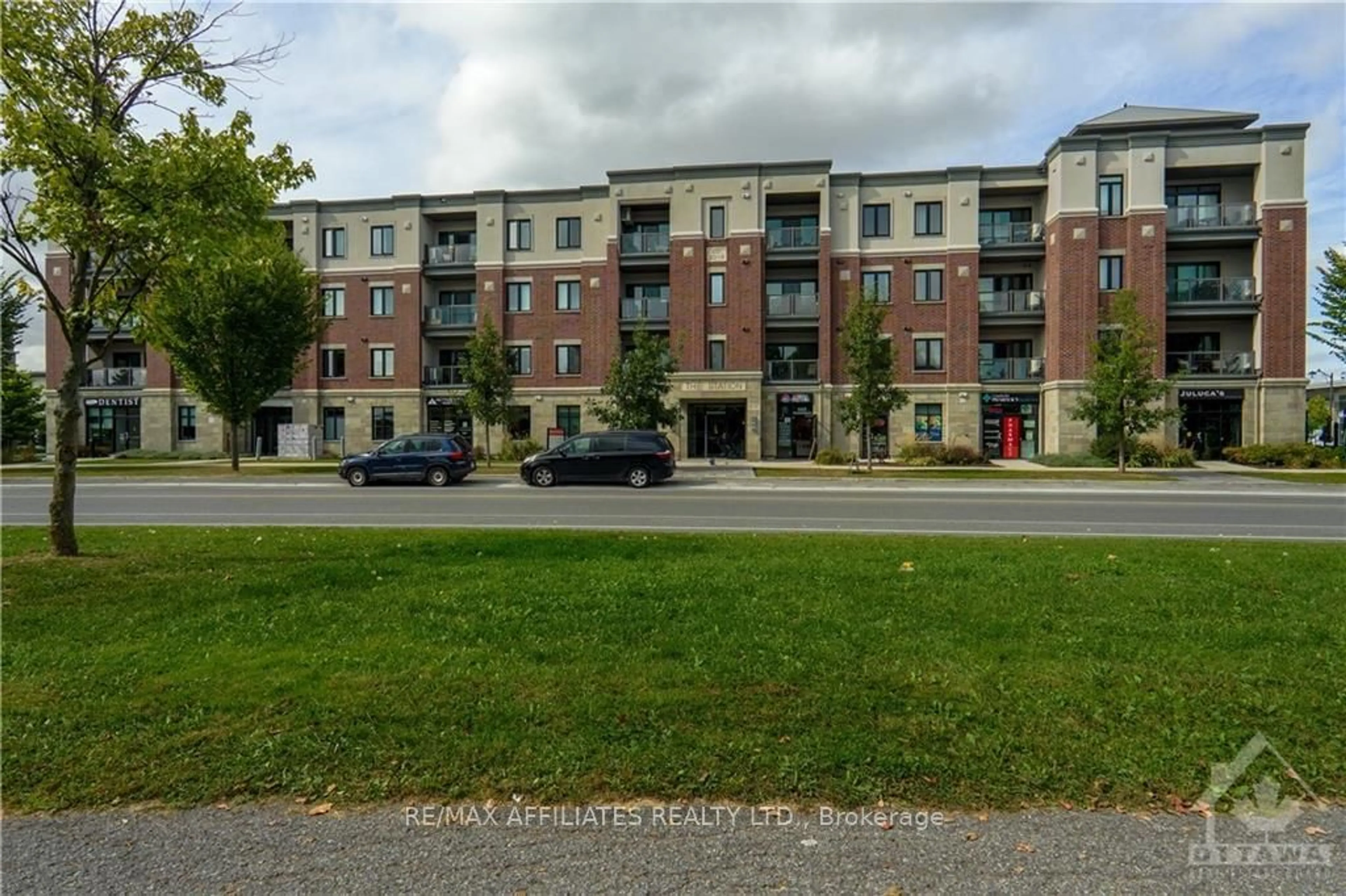 A pic from exterior of the house or condo, the front or back of building for 615 LONGFIELDS Dr #212, Barrhaven Ontario K2J 6J3