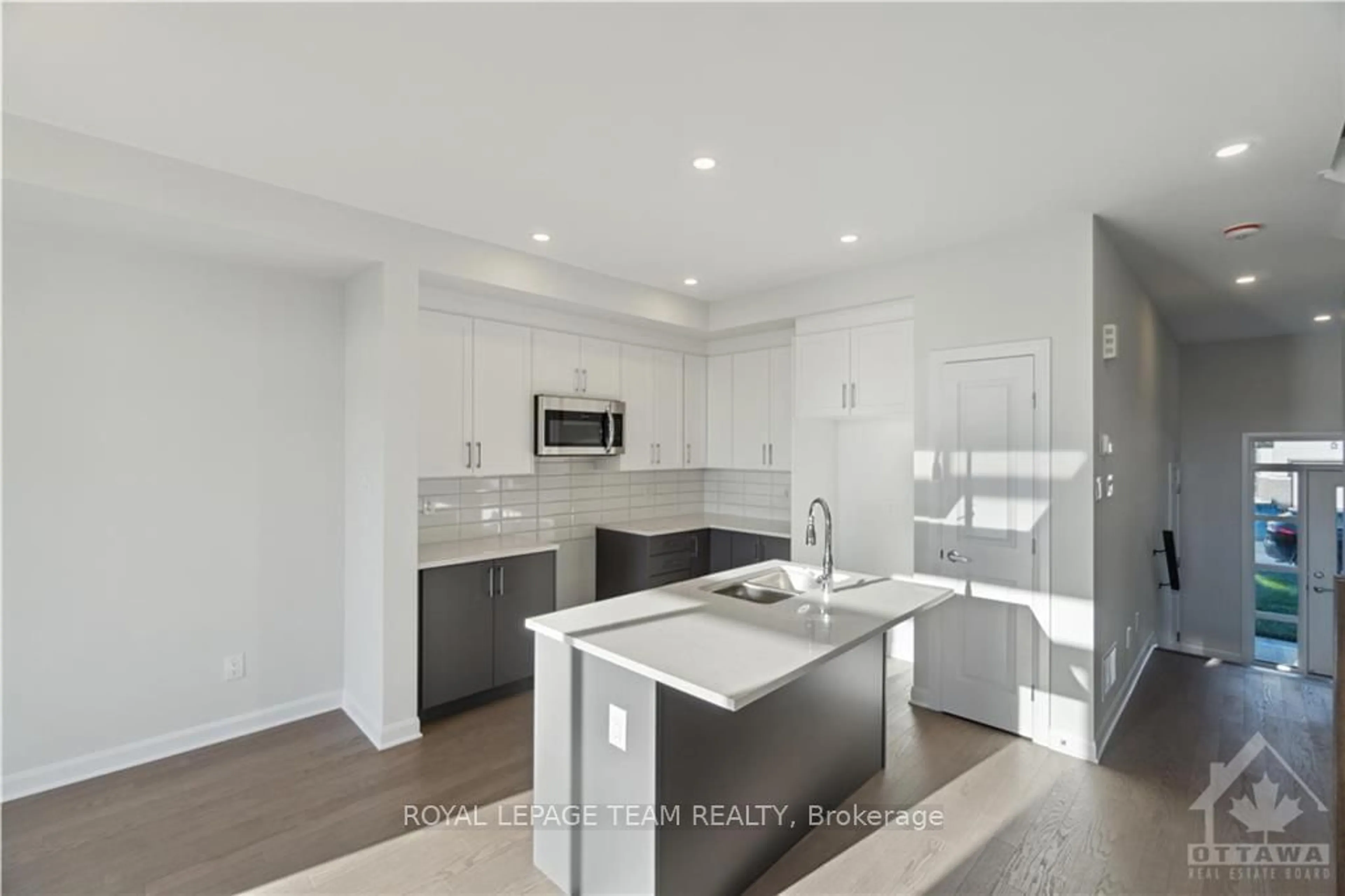 Open concept kitchen for 304 ELSIE MACGILL Walk, Kanata Ontario K2W 0L1