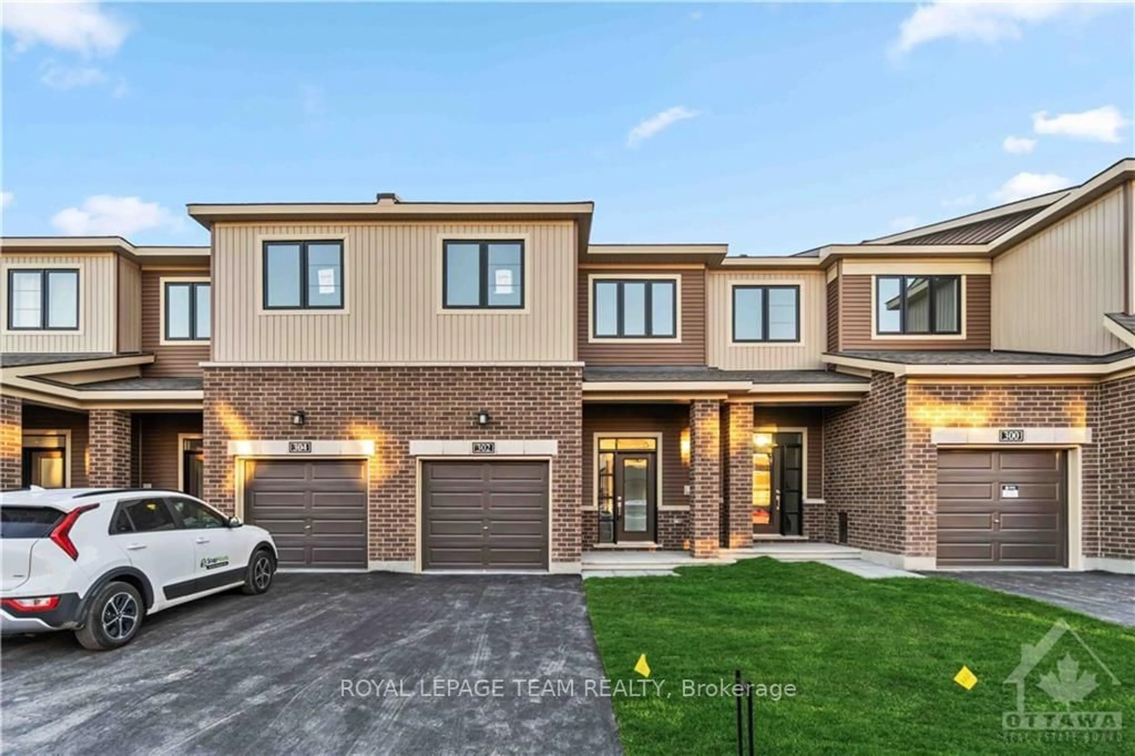 Home with brick exterior material for 302 ELSIE MACGILL Walk, Kanata Ontario K2W 0L1