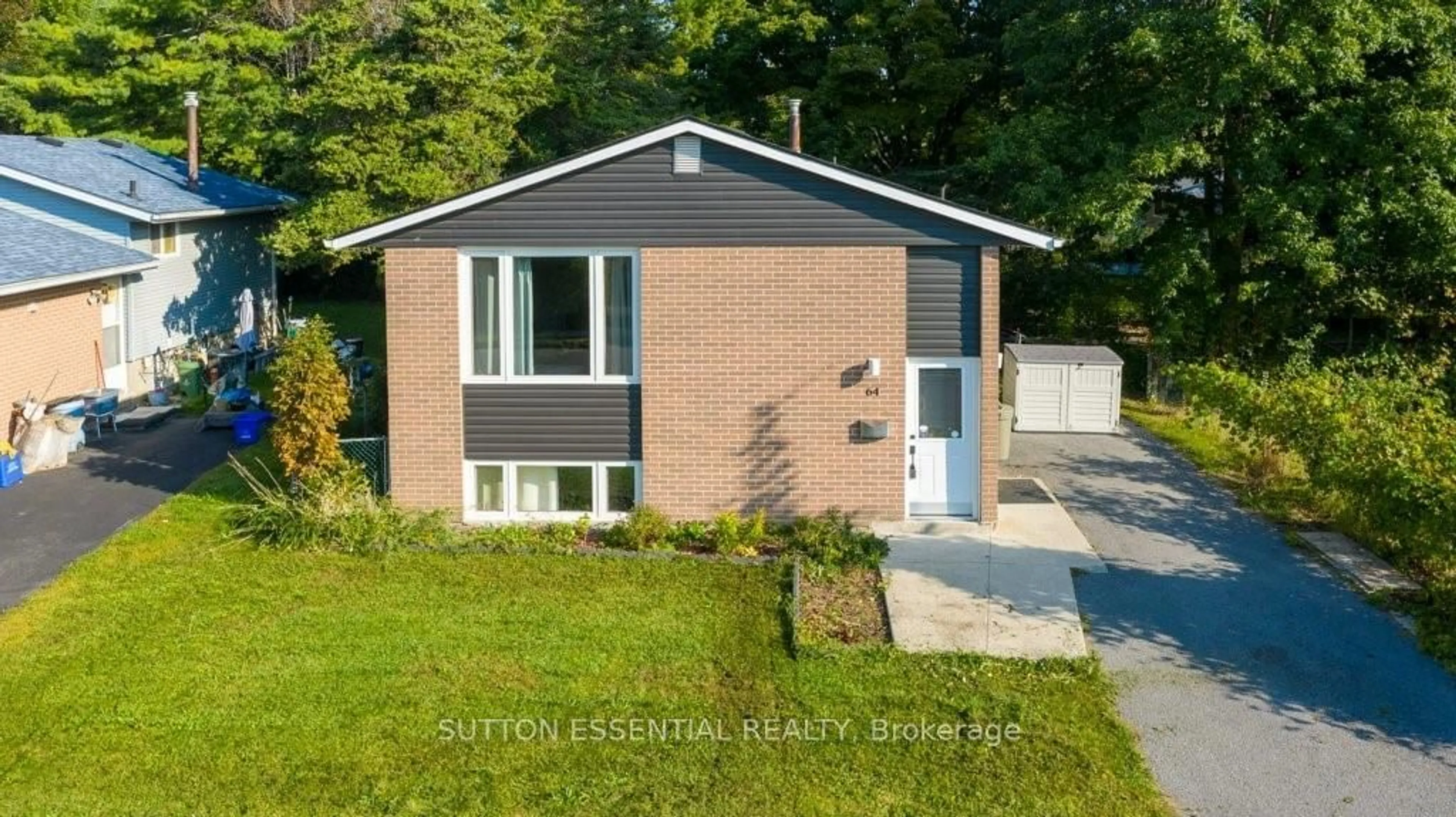 Home with brick exterior material for 64 WOODSTONE Cres, Kingston Ontario K7M 6K9