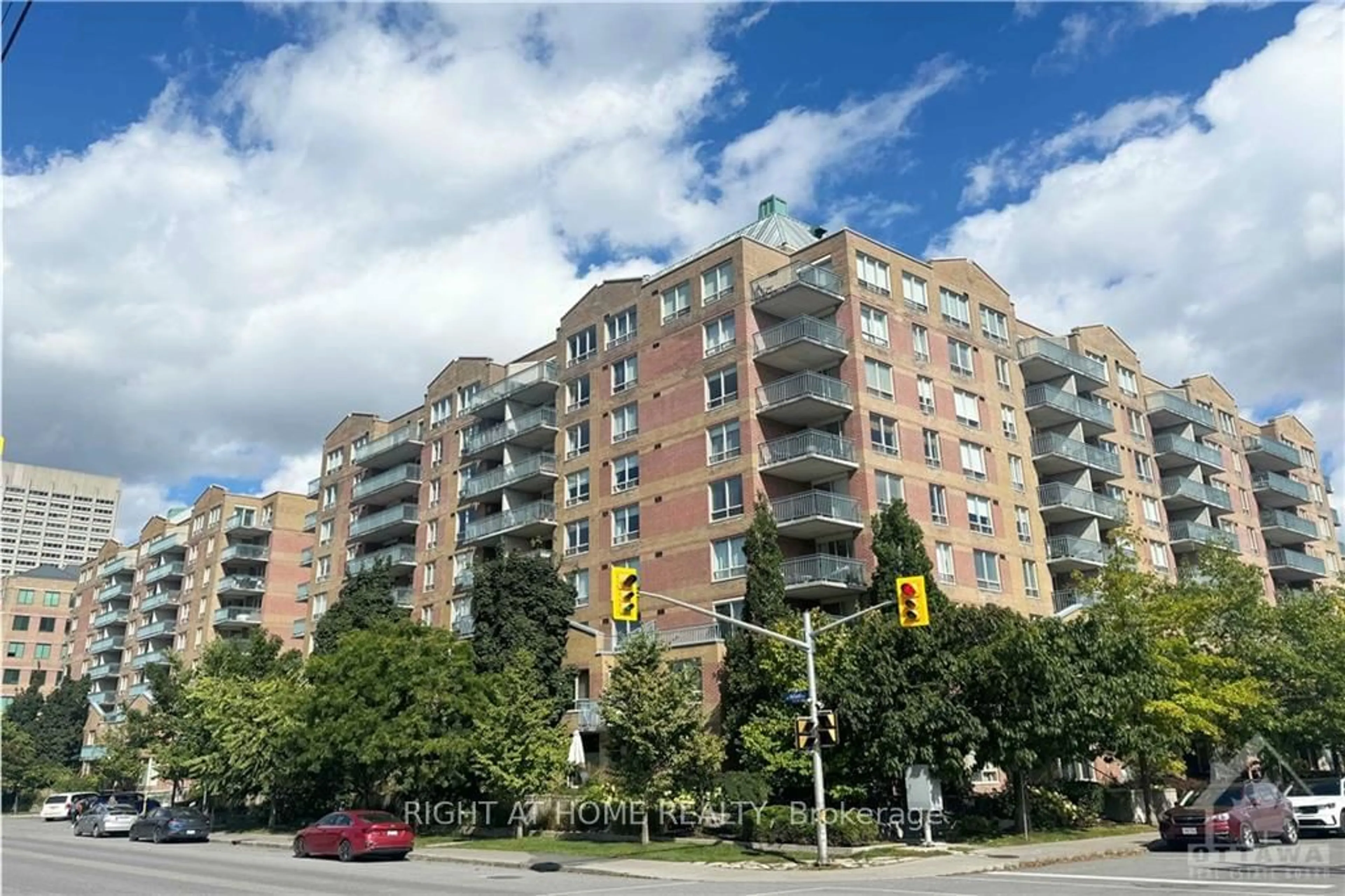 A pic from exterior of the house or condo, the street view for 45 HOLLAND Ave #215, Tunneys Pasture and Ottawa West Ontario K1Y 4S3