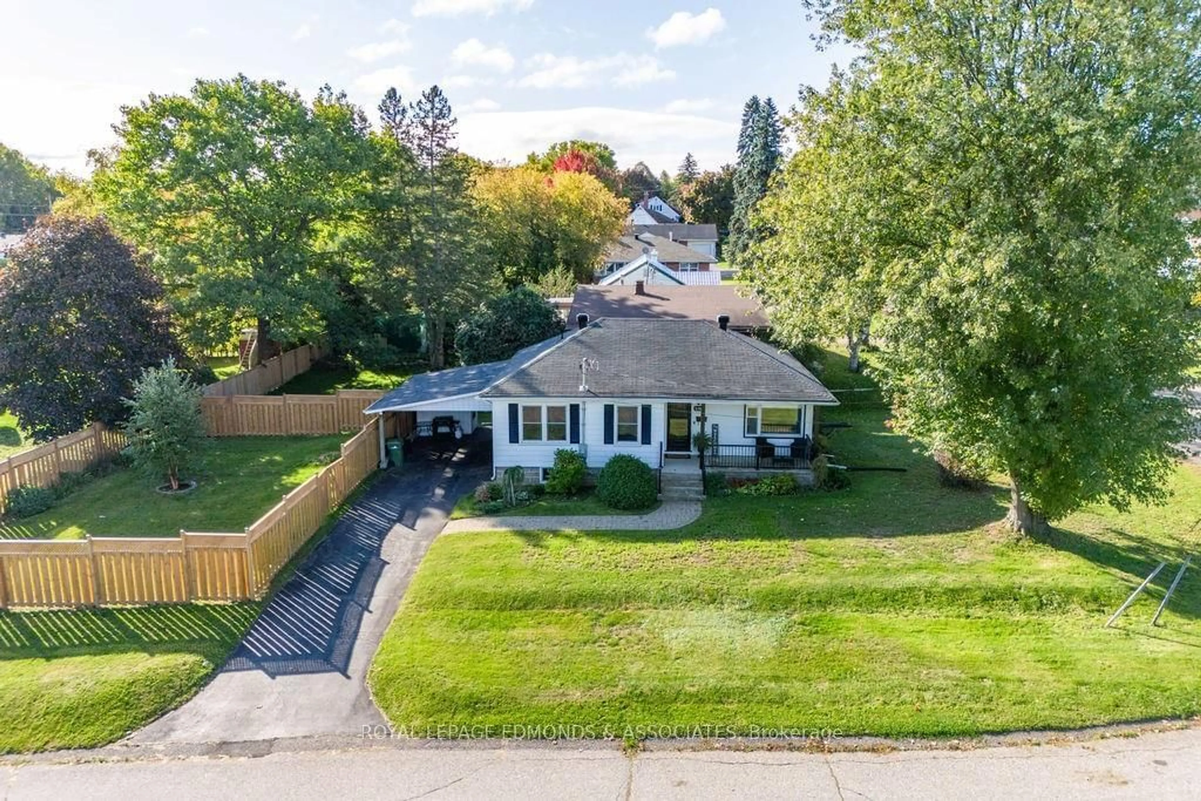 Frontside or backside of a home, the fenced backyard for 536 ESTHER St, Pembroke Ontario K8A 3E9