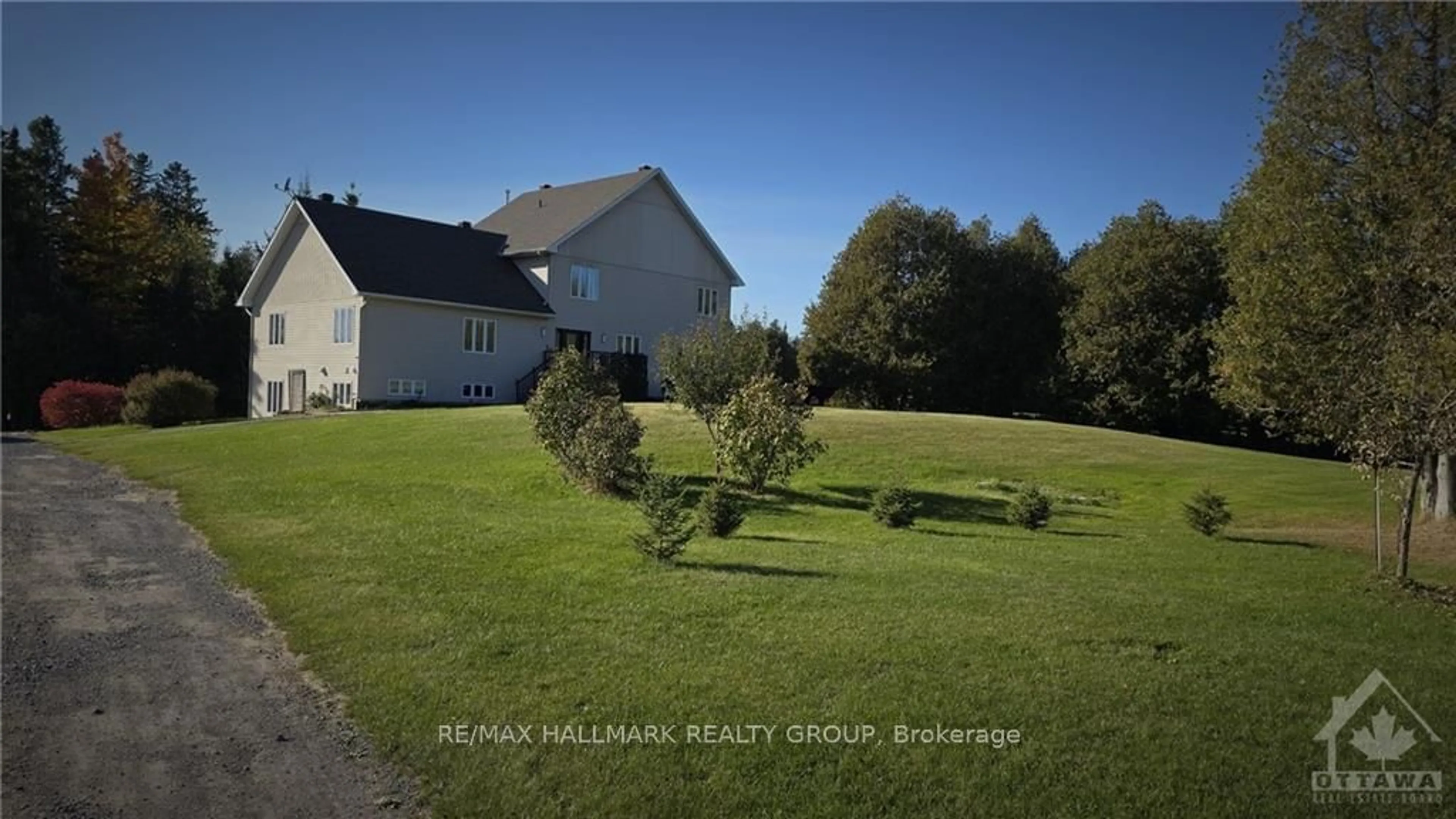 Frontside or backside of a home, the fenced backyard for 103 LADY SLIPPER Way, Carp - Huntley Ward Ontario K0A 1L0