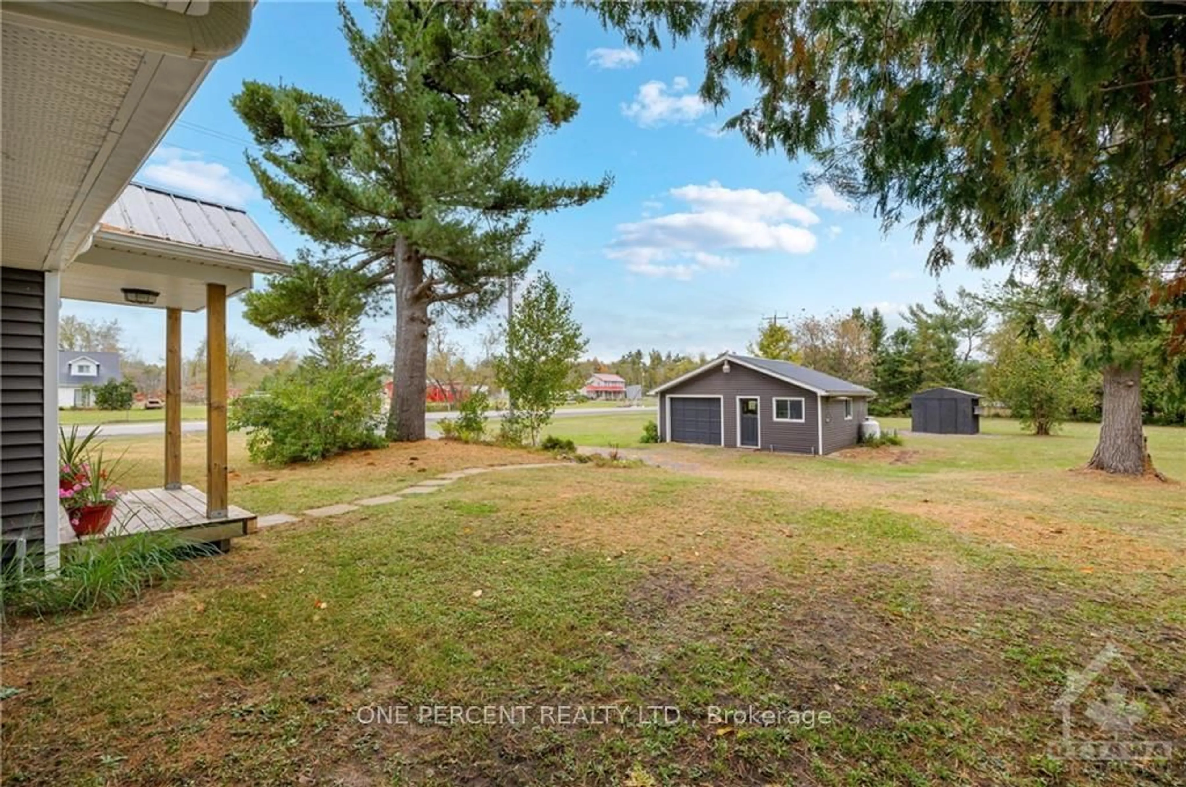 Frontside or backside of a home, the fenced backyard for 2116 COUNTY ROAD 2 Rd, Prescott and Russell Ontario K0B 1C0