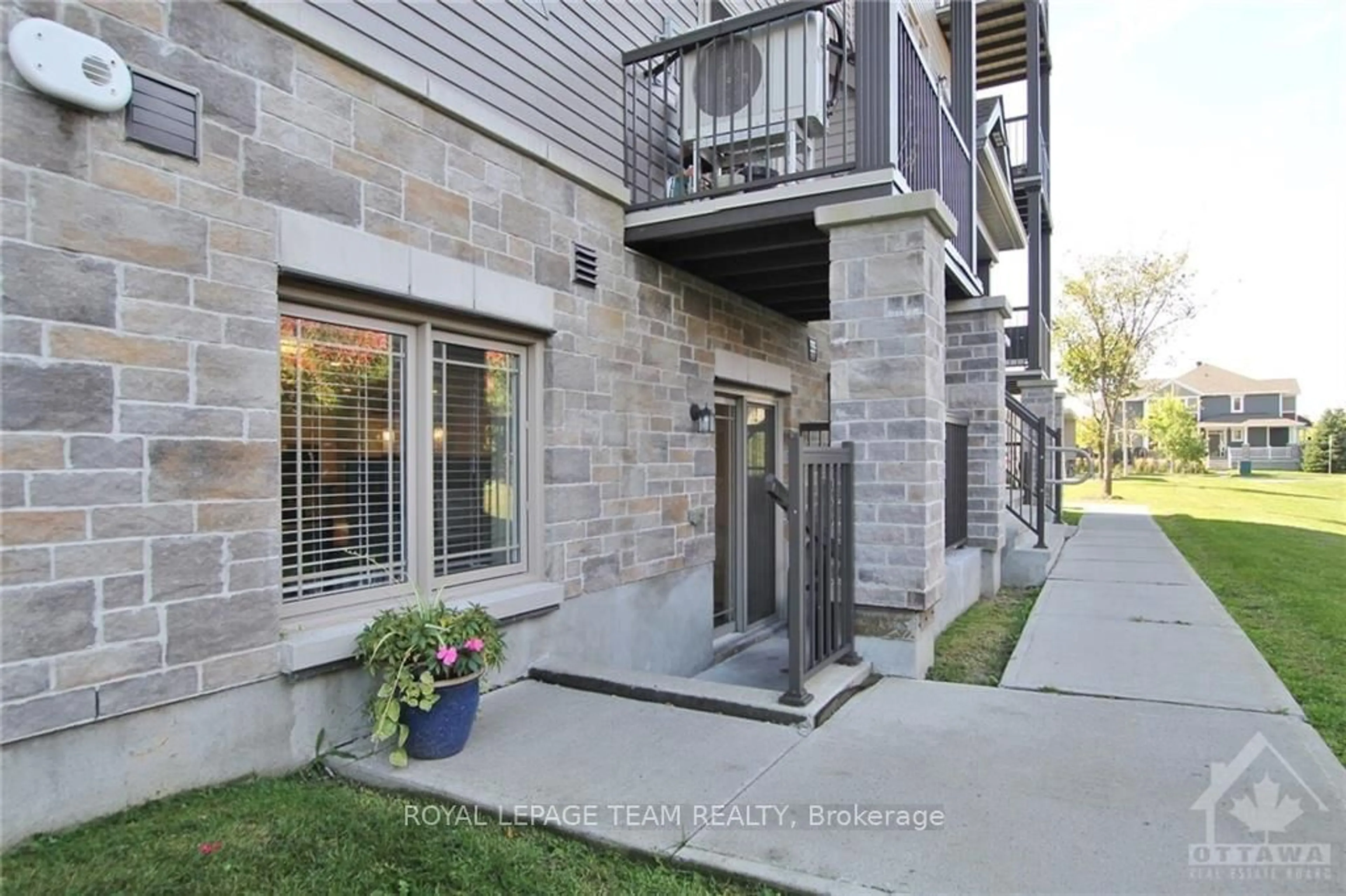 A pic from exterior of the house or condo, the street view for 345 TRIBECA St #2, Barrhaven Ontario K2J 6B4