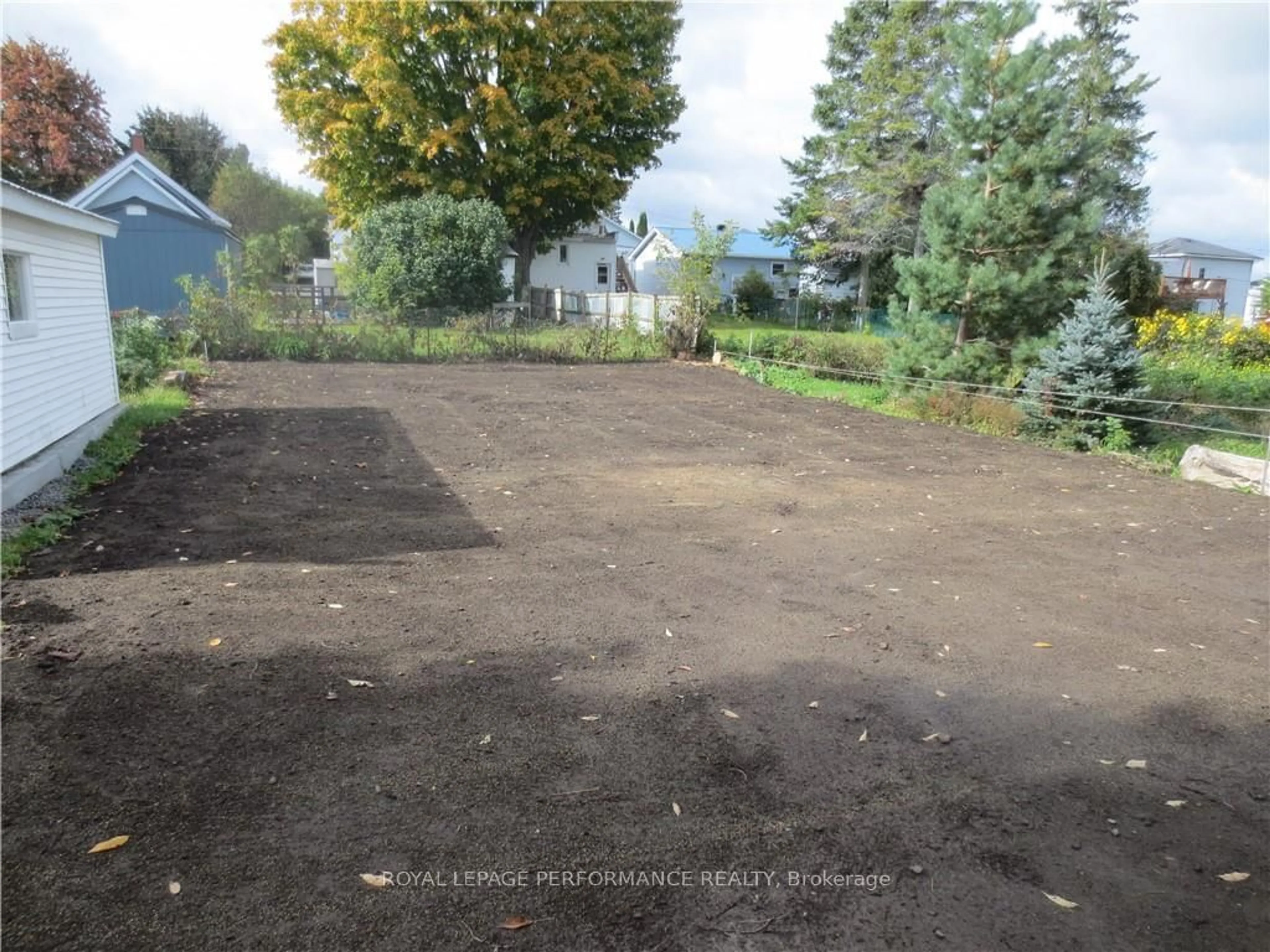 Frontside or backside of a home, the fenced backyard for 106 BISHOP St, North Glengarry Ontario K0C 1A0