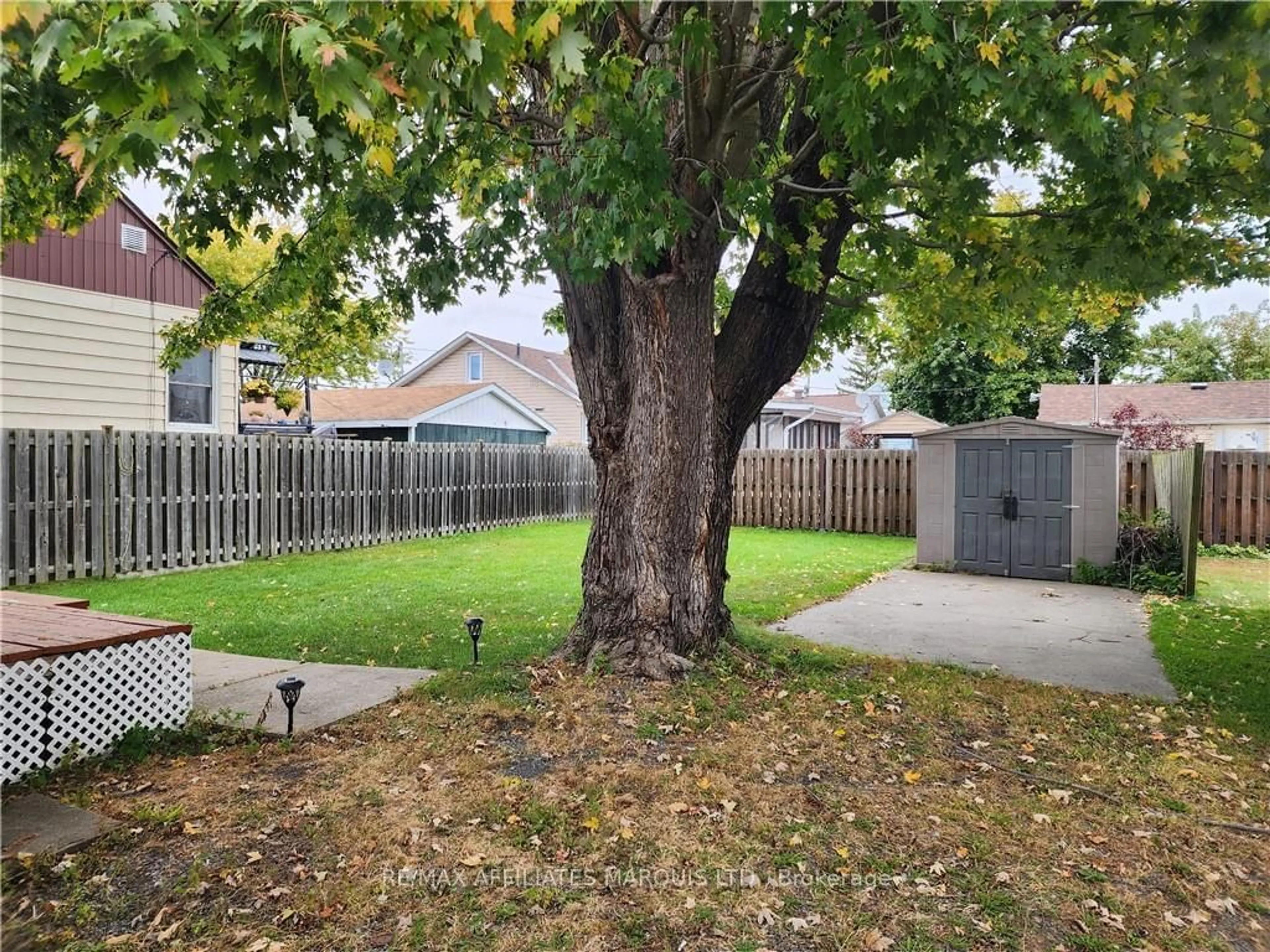 Frontside or backside of a home, the fenced backyard for 1119 PITT St, Cornwall Ontario K6J 3S8