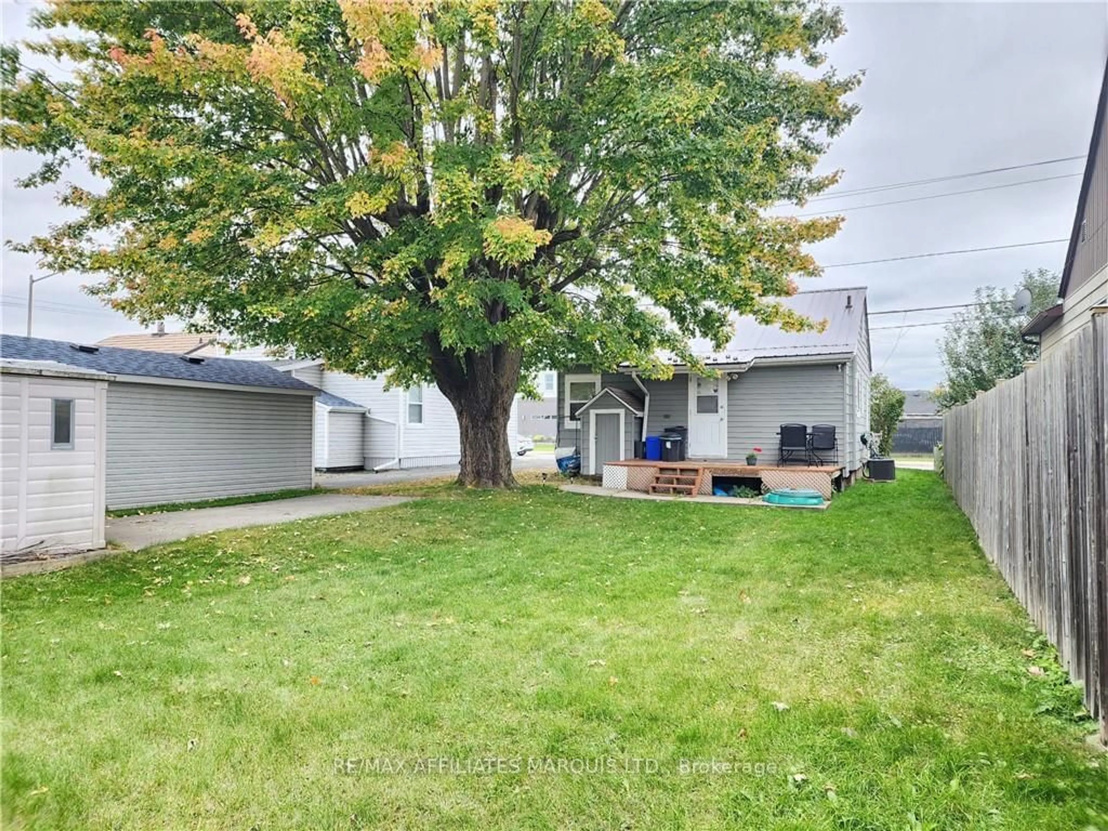 Frontside or backside of a home, the fenced backyard for 1119 PITT St, Cornwall Ontario K6J 3S8